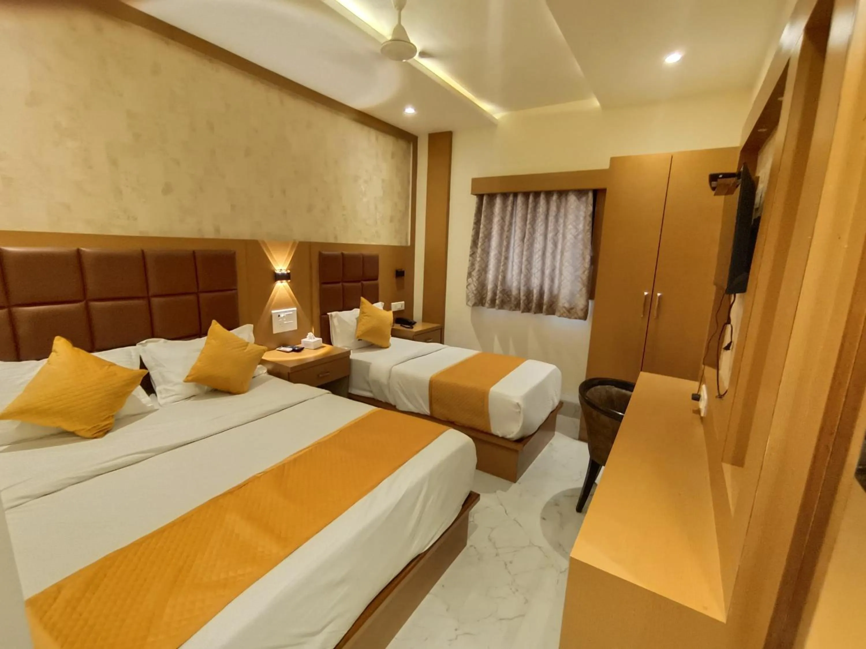 Bed in Hotel Riva International Goregaon- Near NESCO