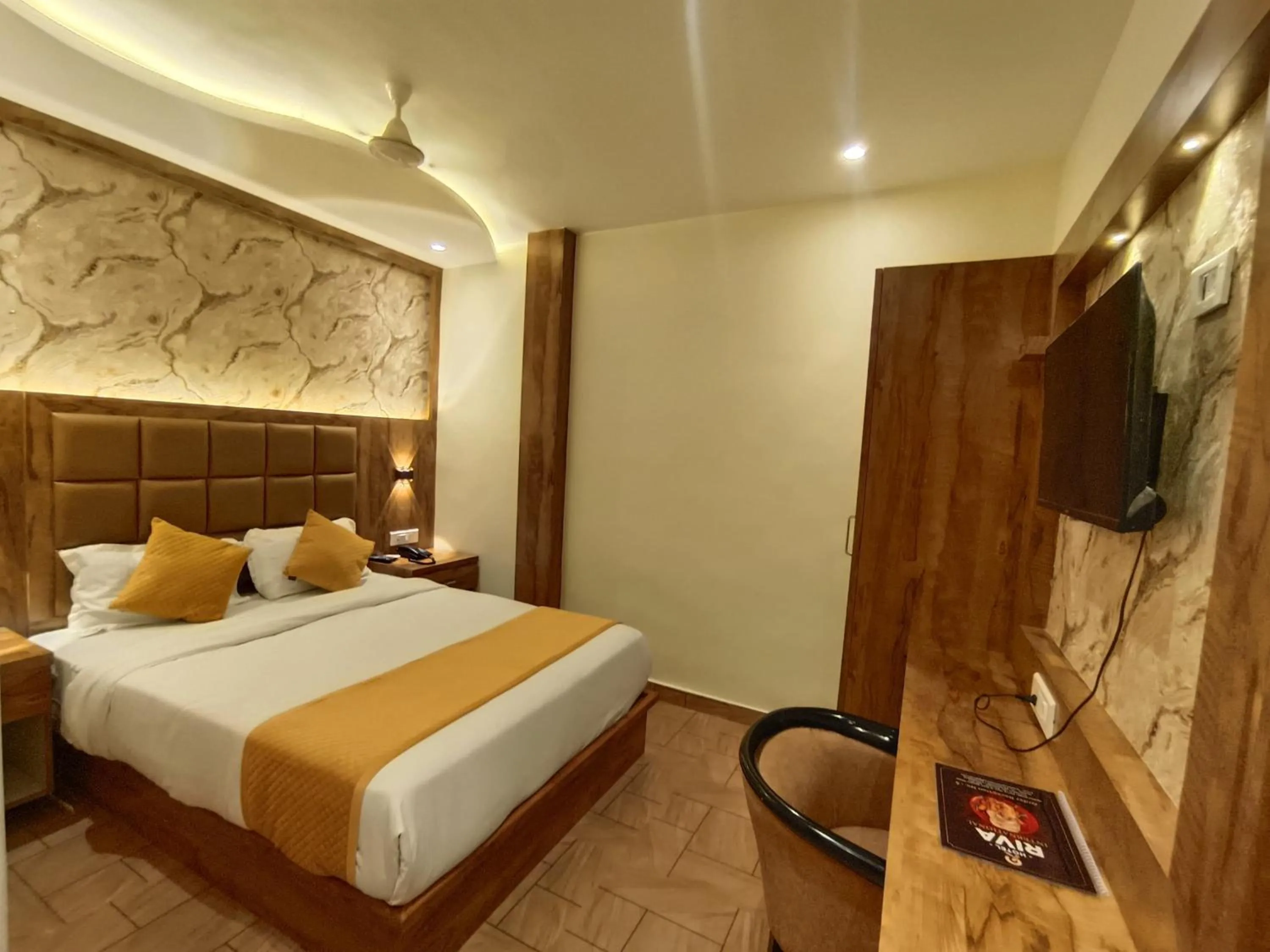 Bed in Hotel Riva International Goregaon- Near NESCO