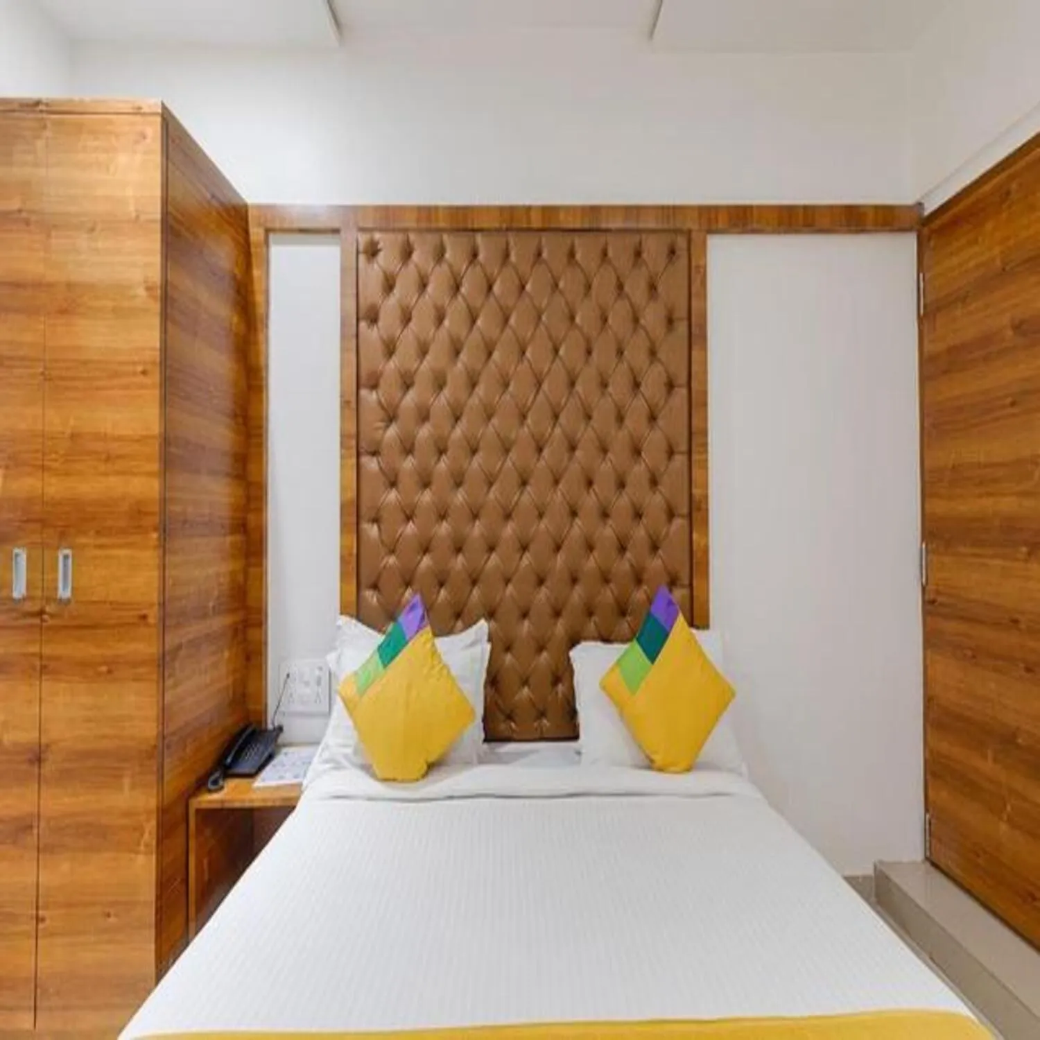 Bed in Hotel Riva International Goregaon- Near NESCO