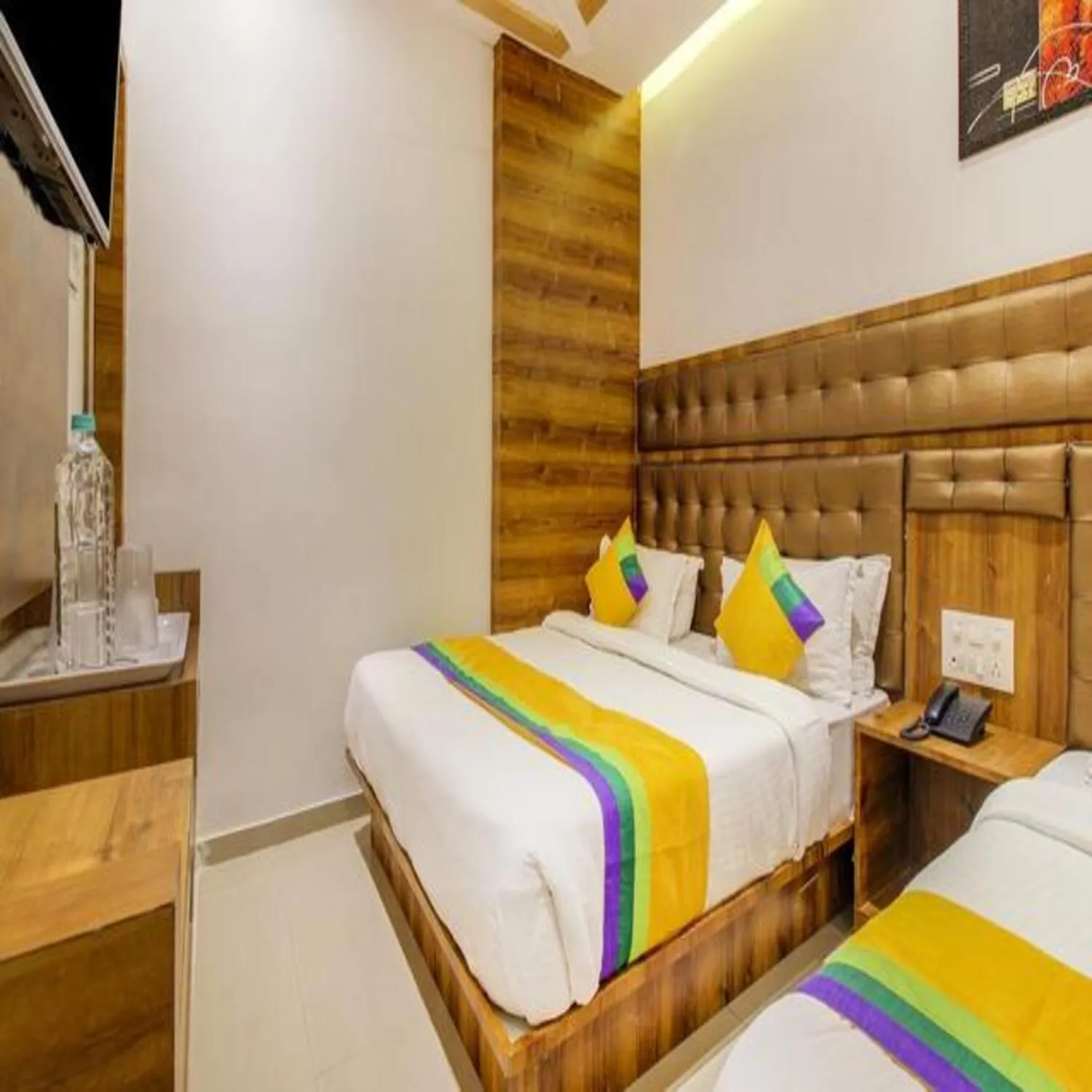 Bed in Hotel Riva International Goregaon- Near NESCO