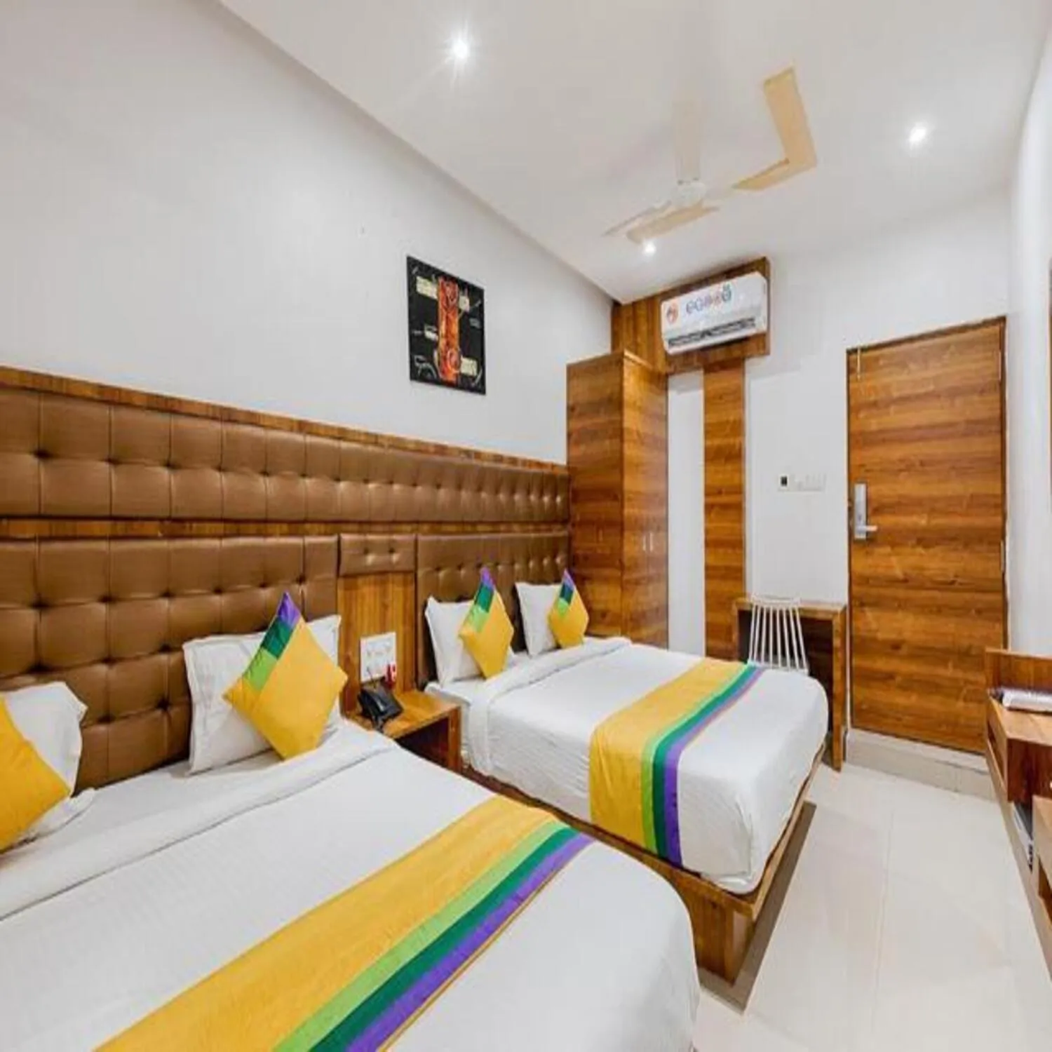 Bed in Hotel Riva International Goregaon- Near NESCO