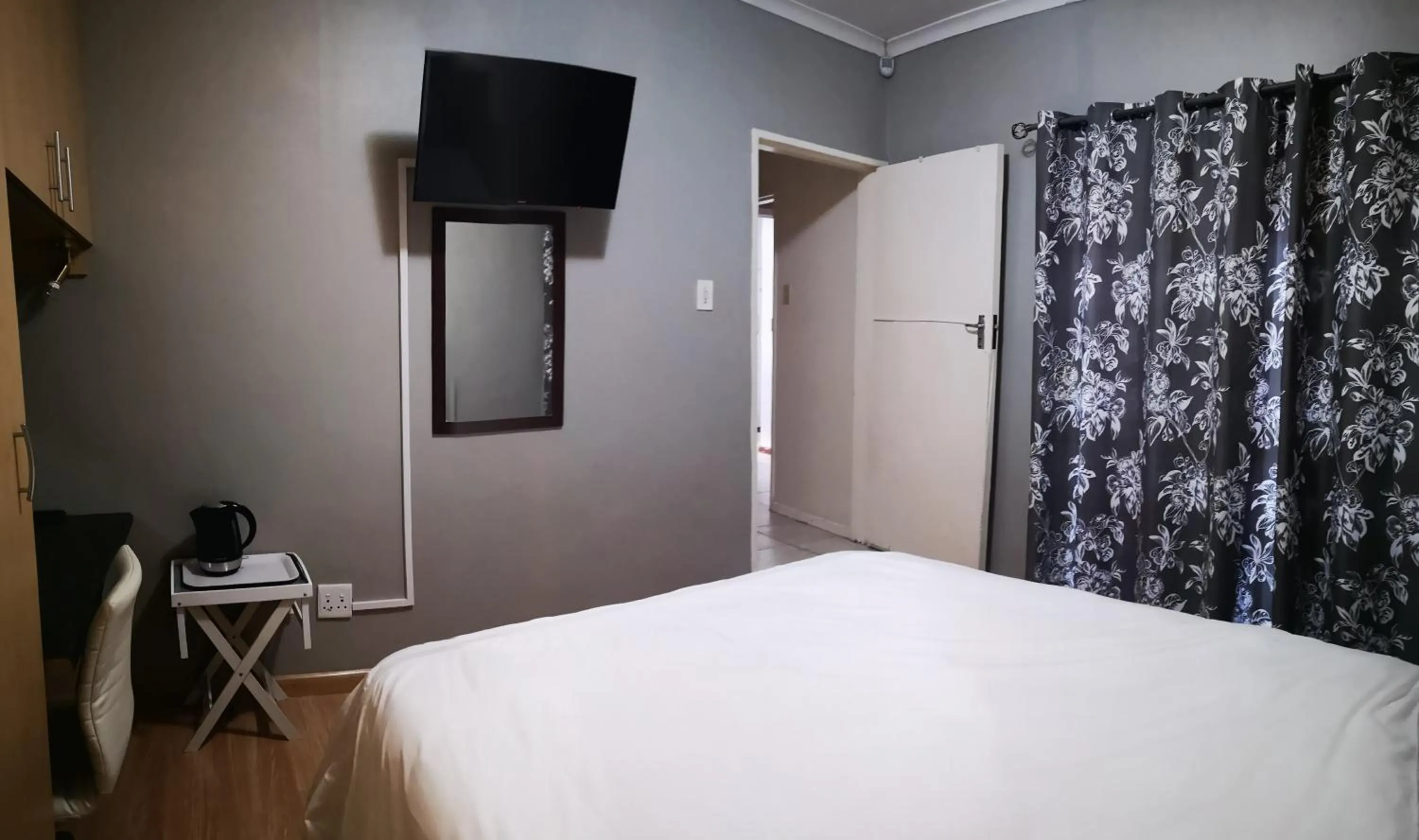 Decorative detail, Bed in TwinnPalms Accommodation