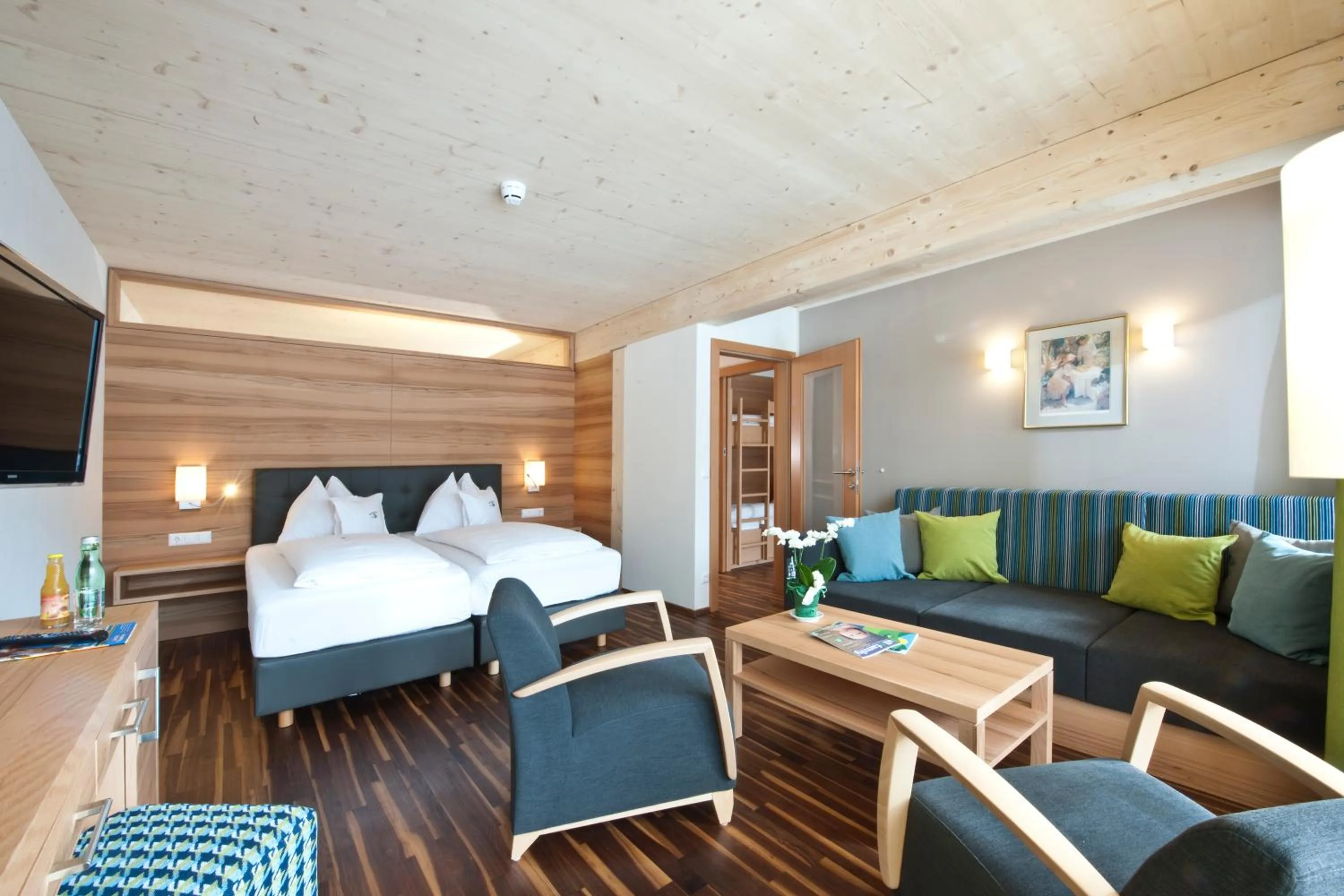 Living room, Bed in Familien- Sportresort BRENNSEEHOF