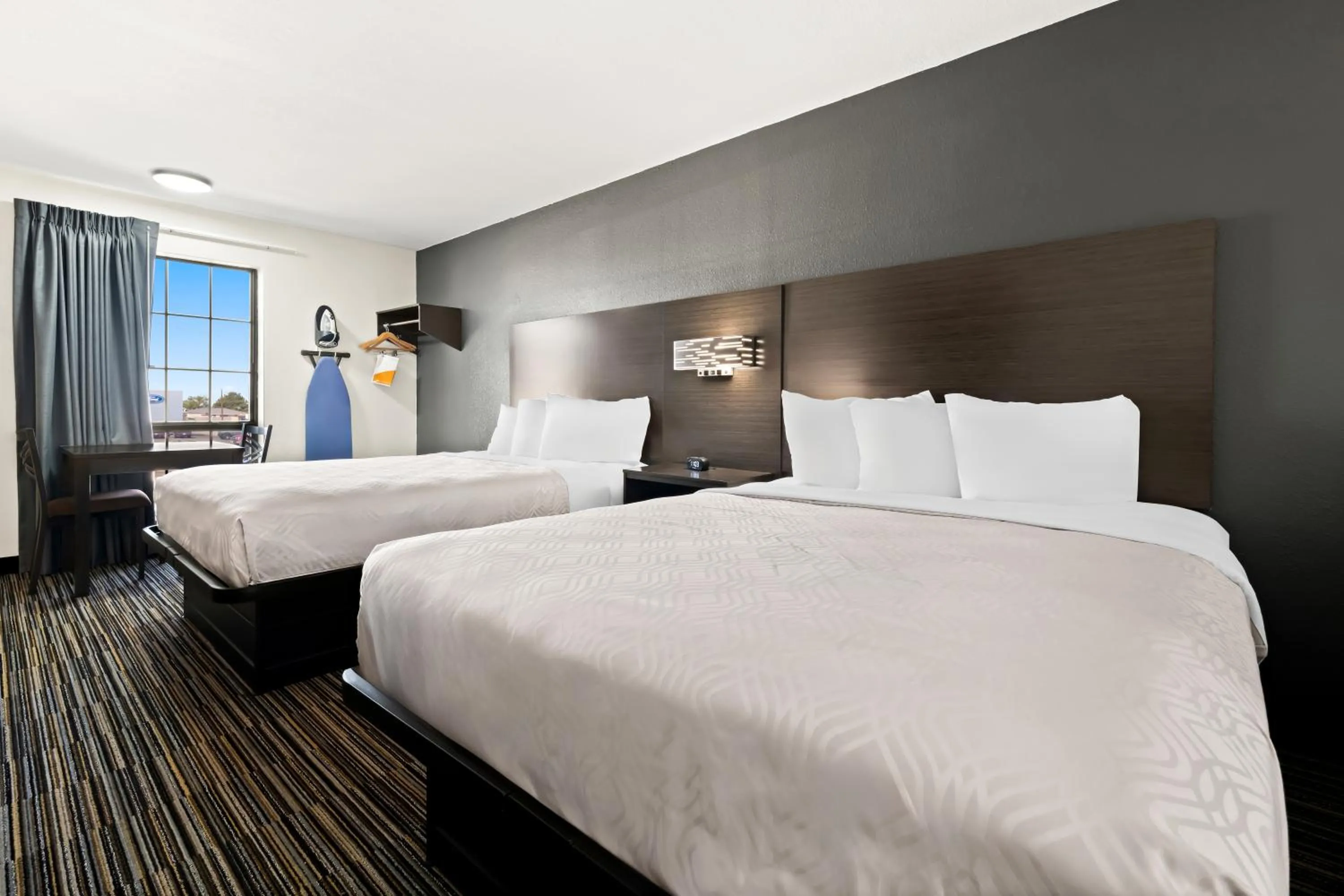 Bed in Econo Lodge Dumas