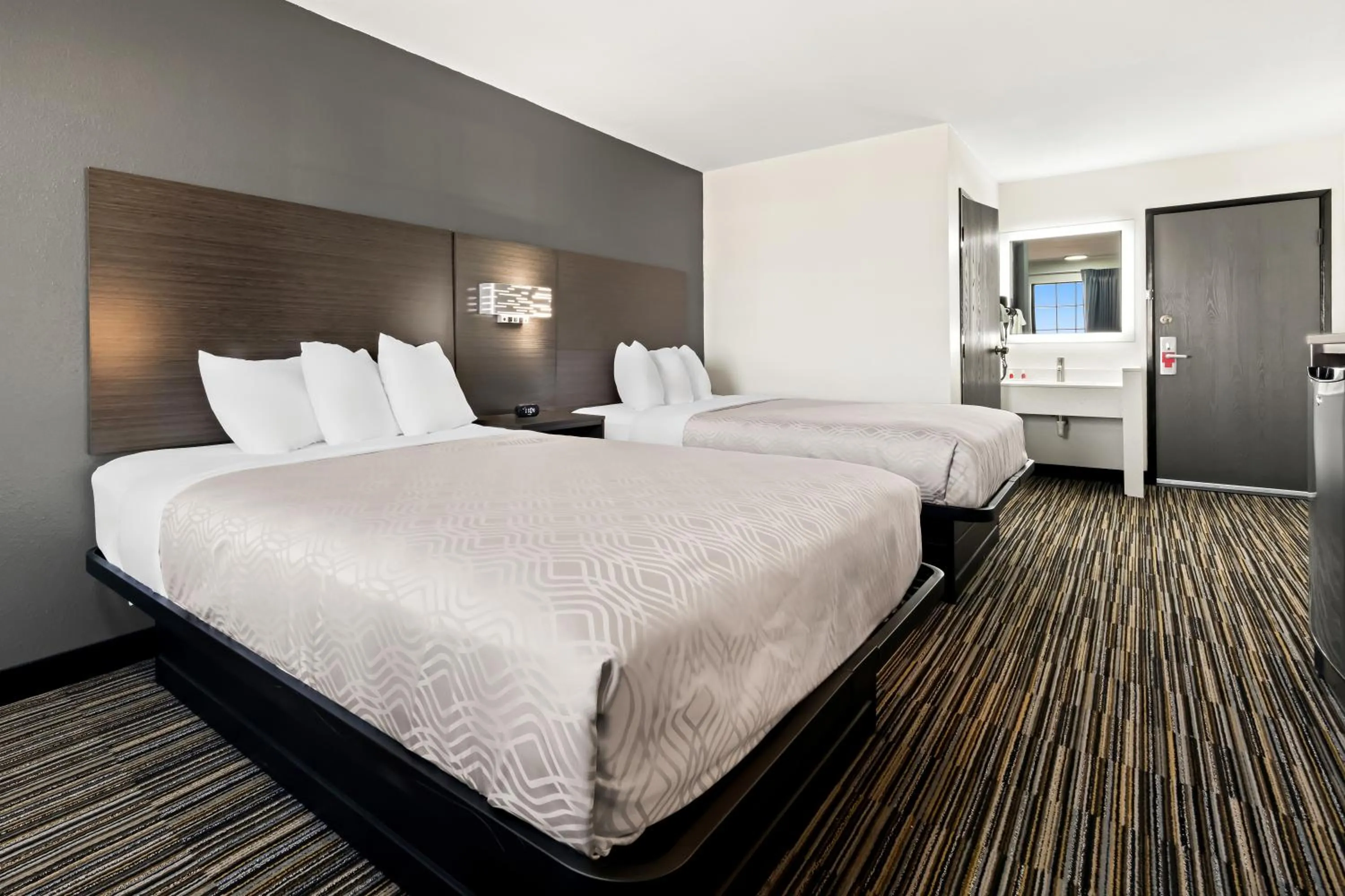 Bed in Econo Lodge Dumas