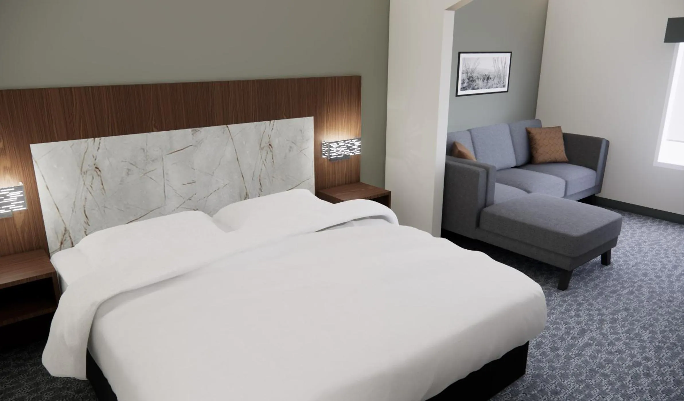 Seating area, Bed in Quality Suites Austin South Street Elmo District