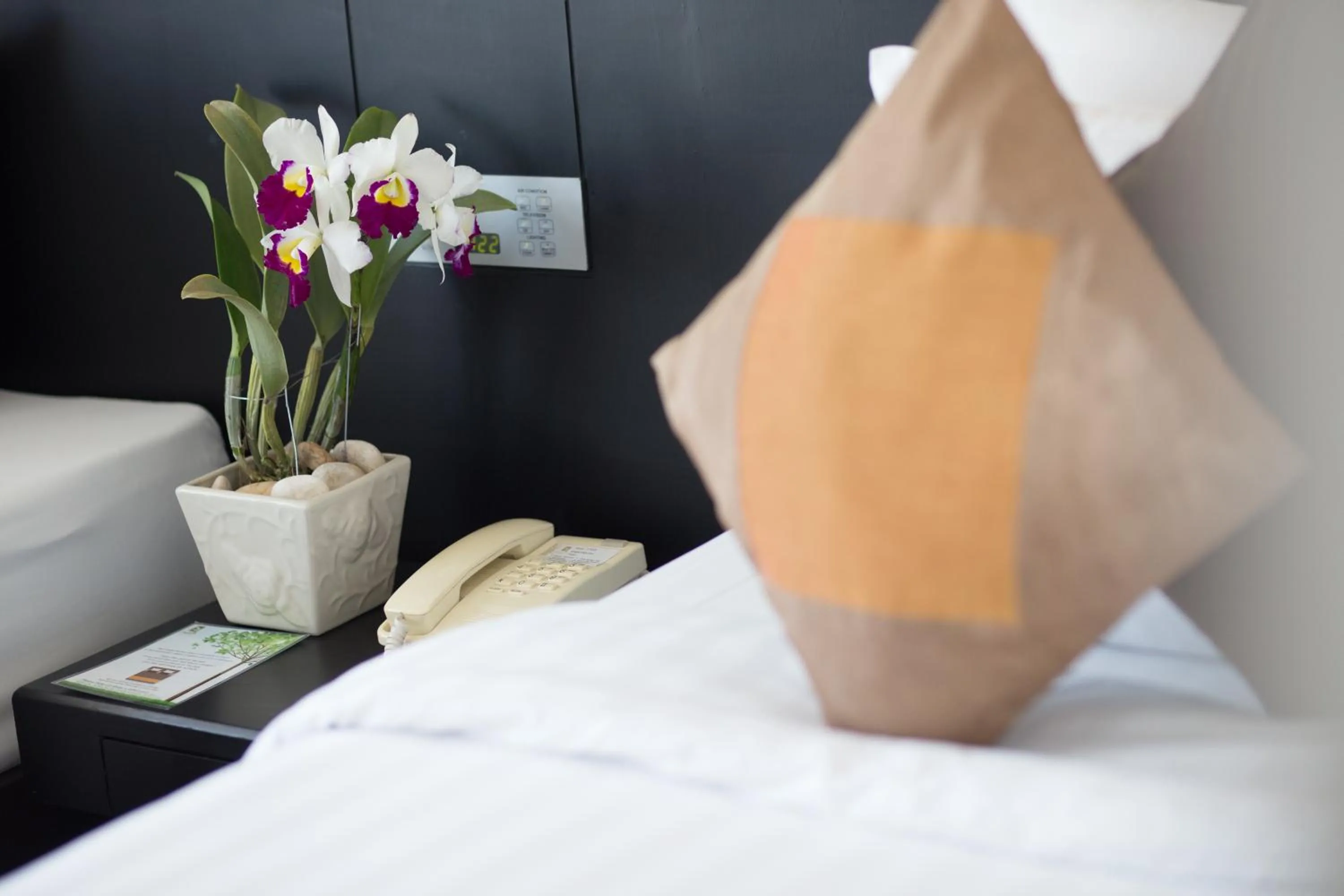 Bed in Gold Orchid Bangkok Hotel