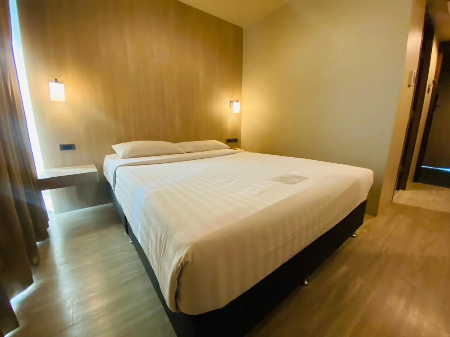 Bed in Gold Orchid Bangkok Hotel