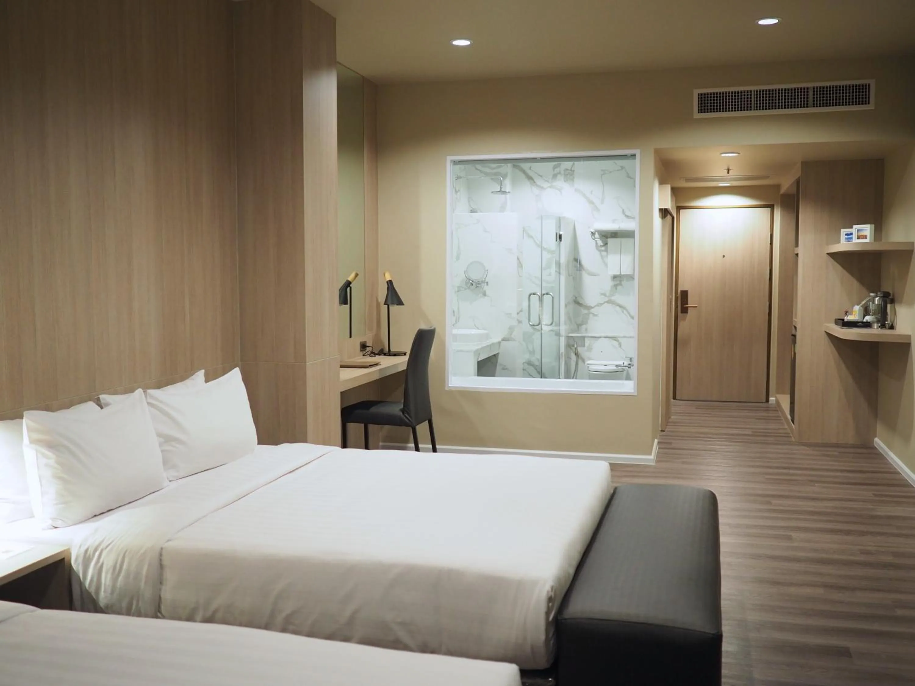 Bed in Gold Orchid Bangkok Hotel