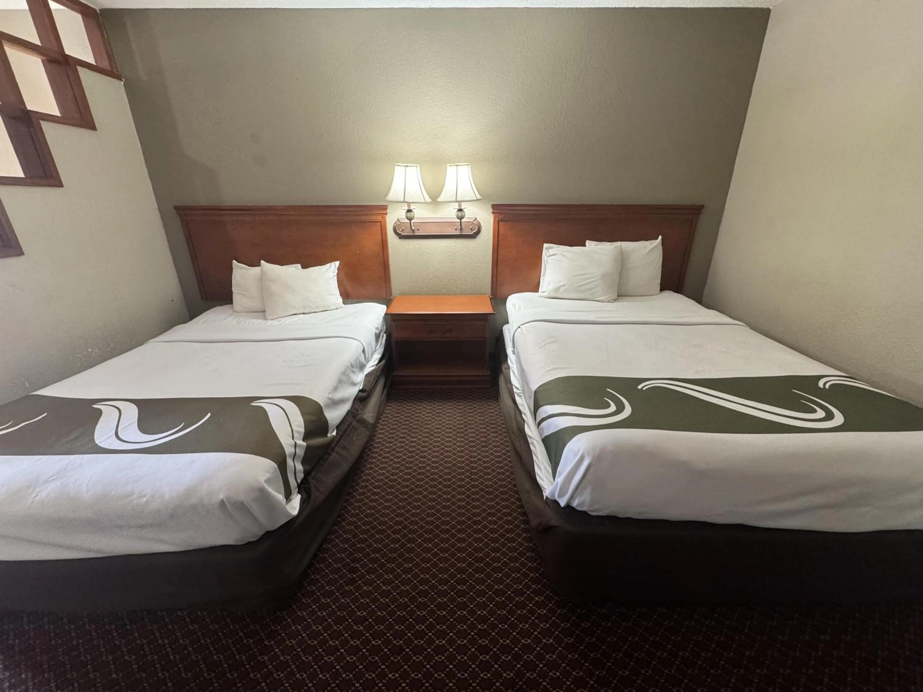 Bed in Rodeway Inn & Suites South of Fiesta Park