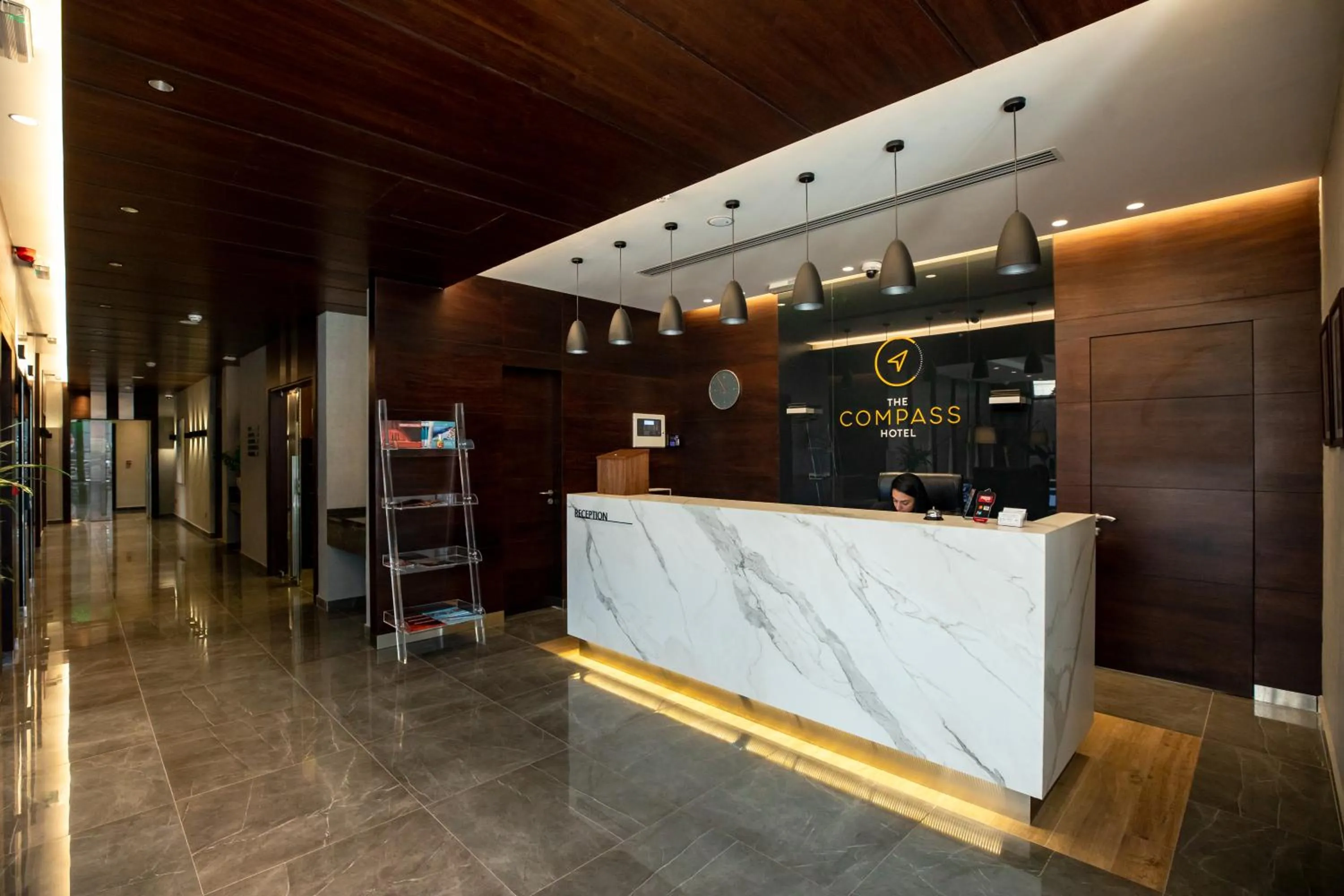 Lobby or reception in The Compass Hotel