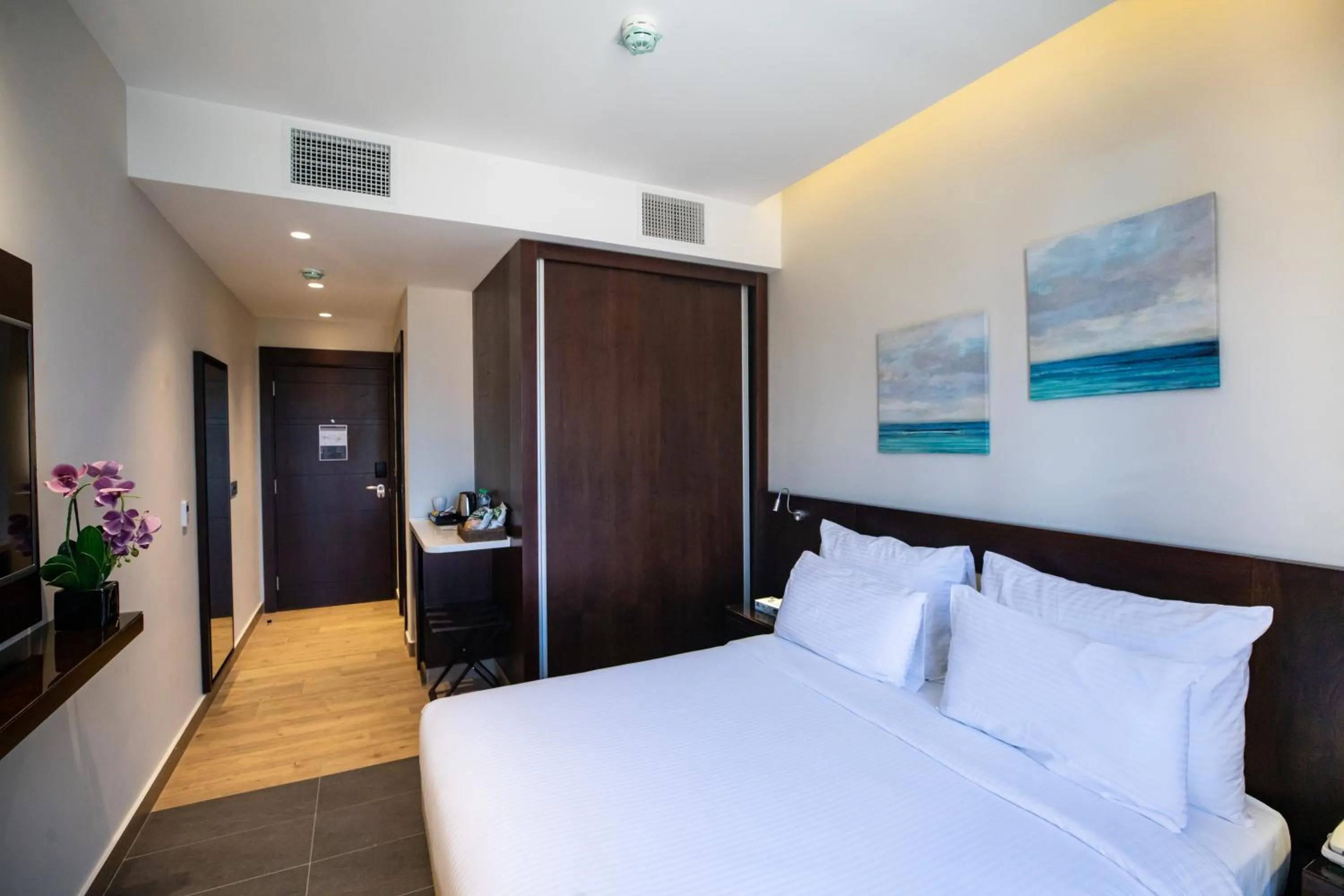 Bed in The Compass Hotel