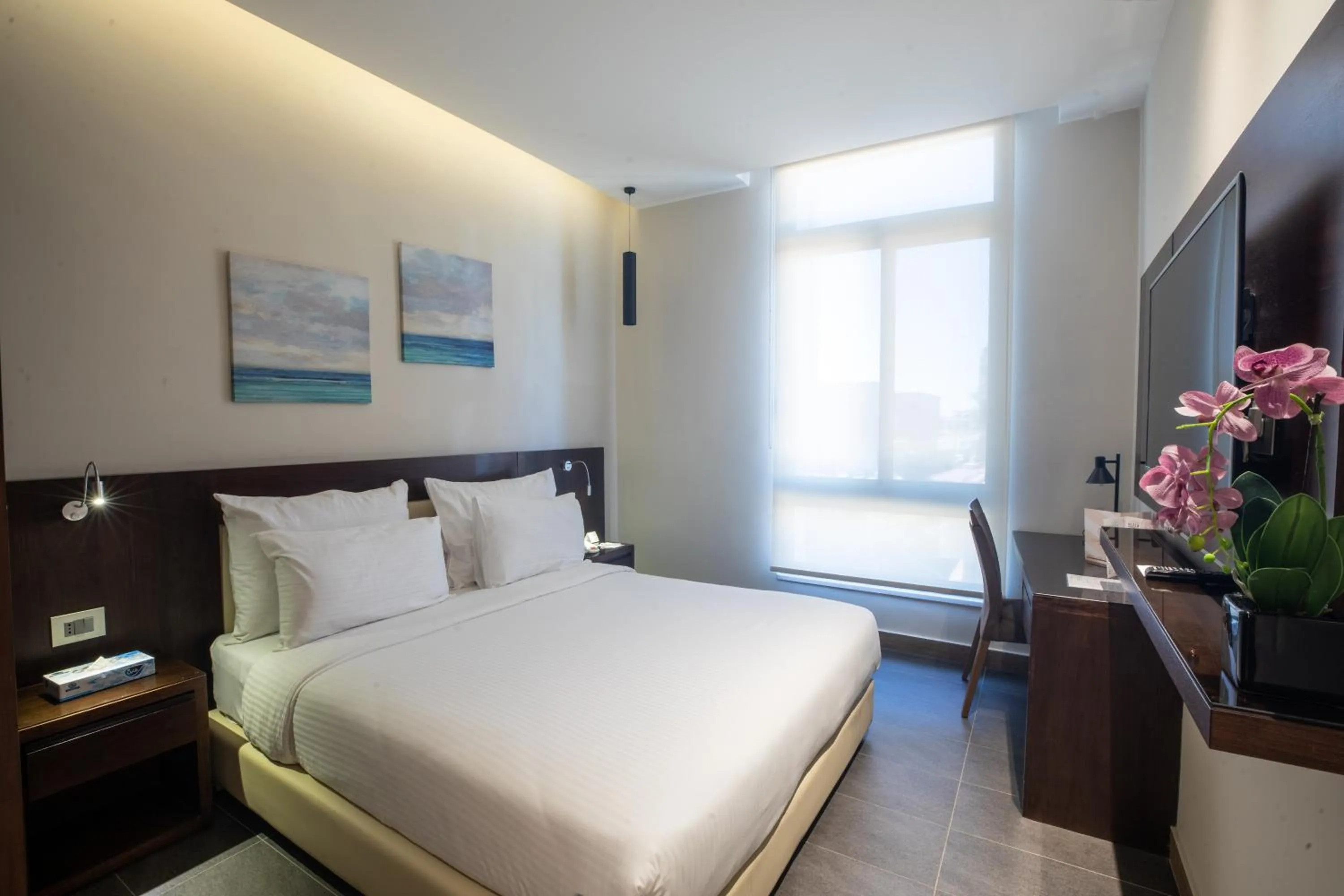 Bed in The Compass Hotel