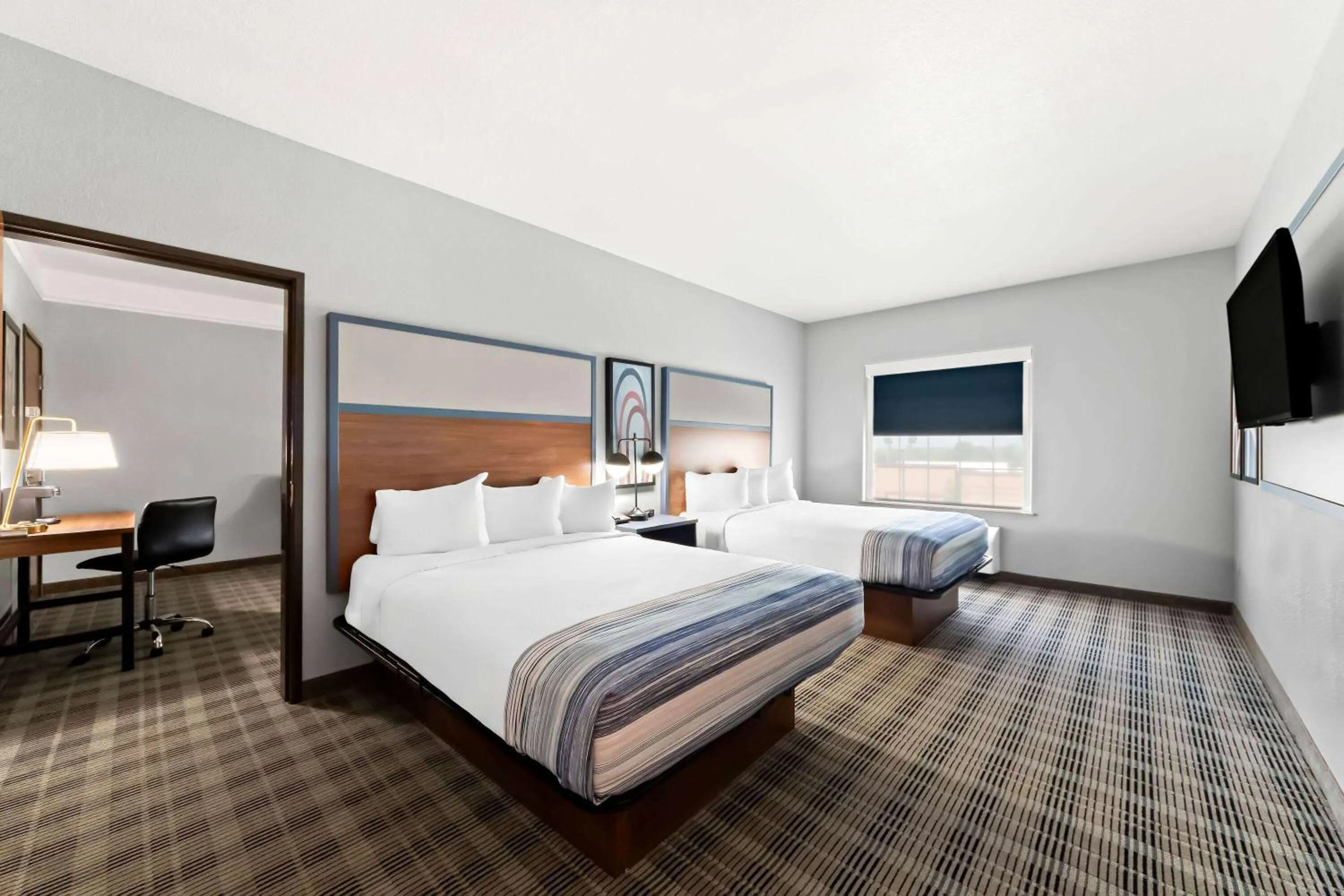 Photo of the whole room, Bed in AmericInn by Wyndham New Braunfels