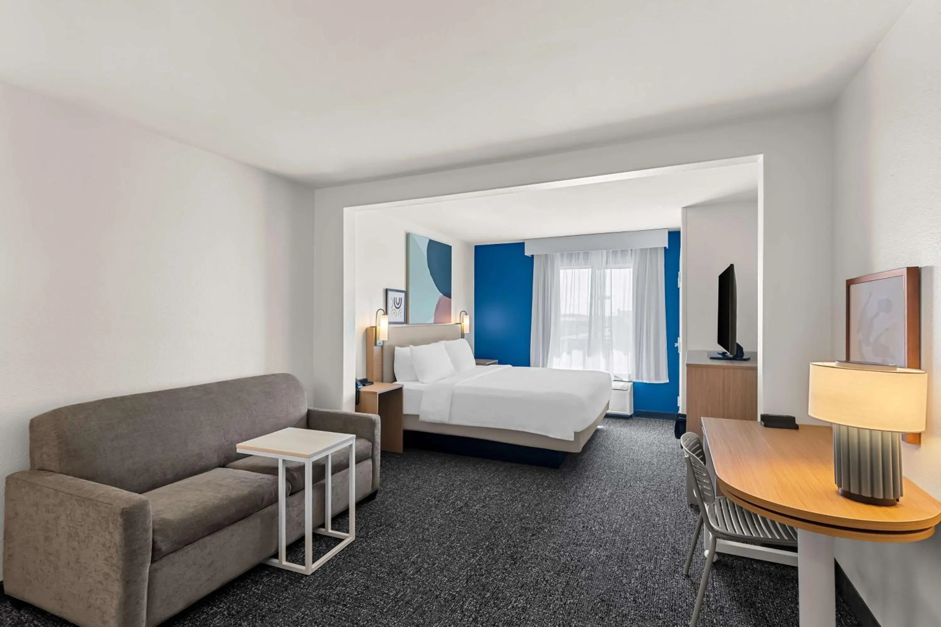 Living room, Bed in Sleep Inn & Suites Near Fort Cavazos