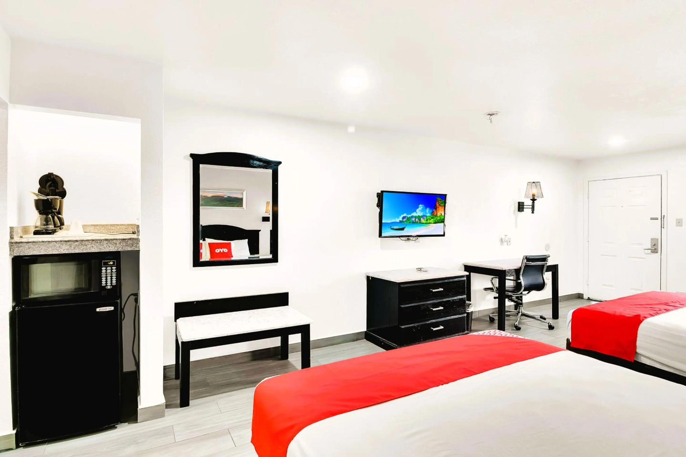 Bedroom, Bed in Three Rivers Executive Inn & Suites By OYO