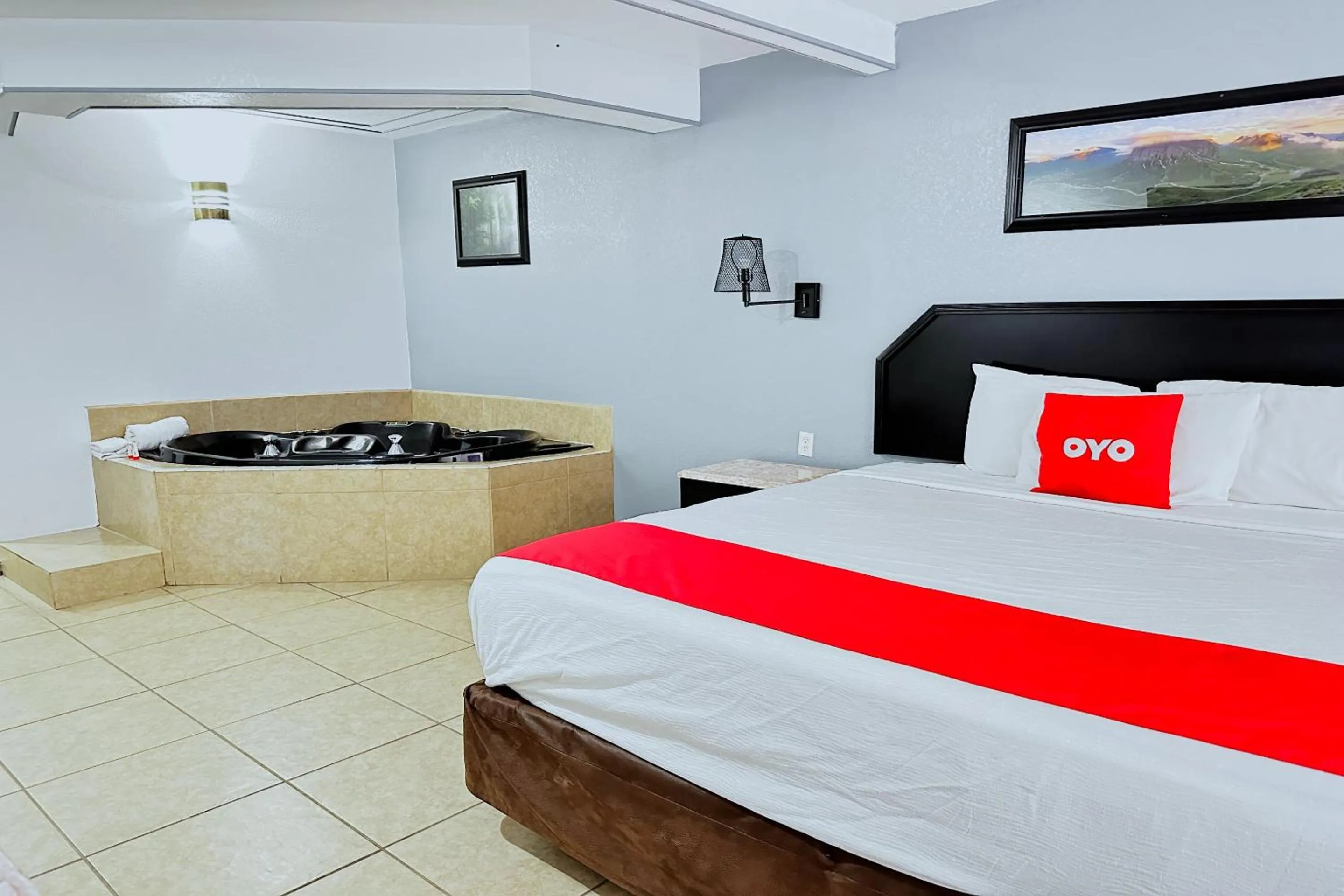 Bedroom, Bed in Three Rivers Executive Inn & Suites By OYO