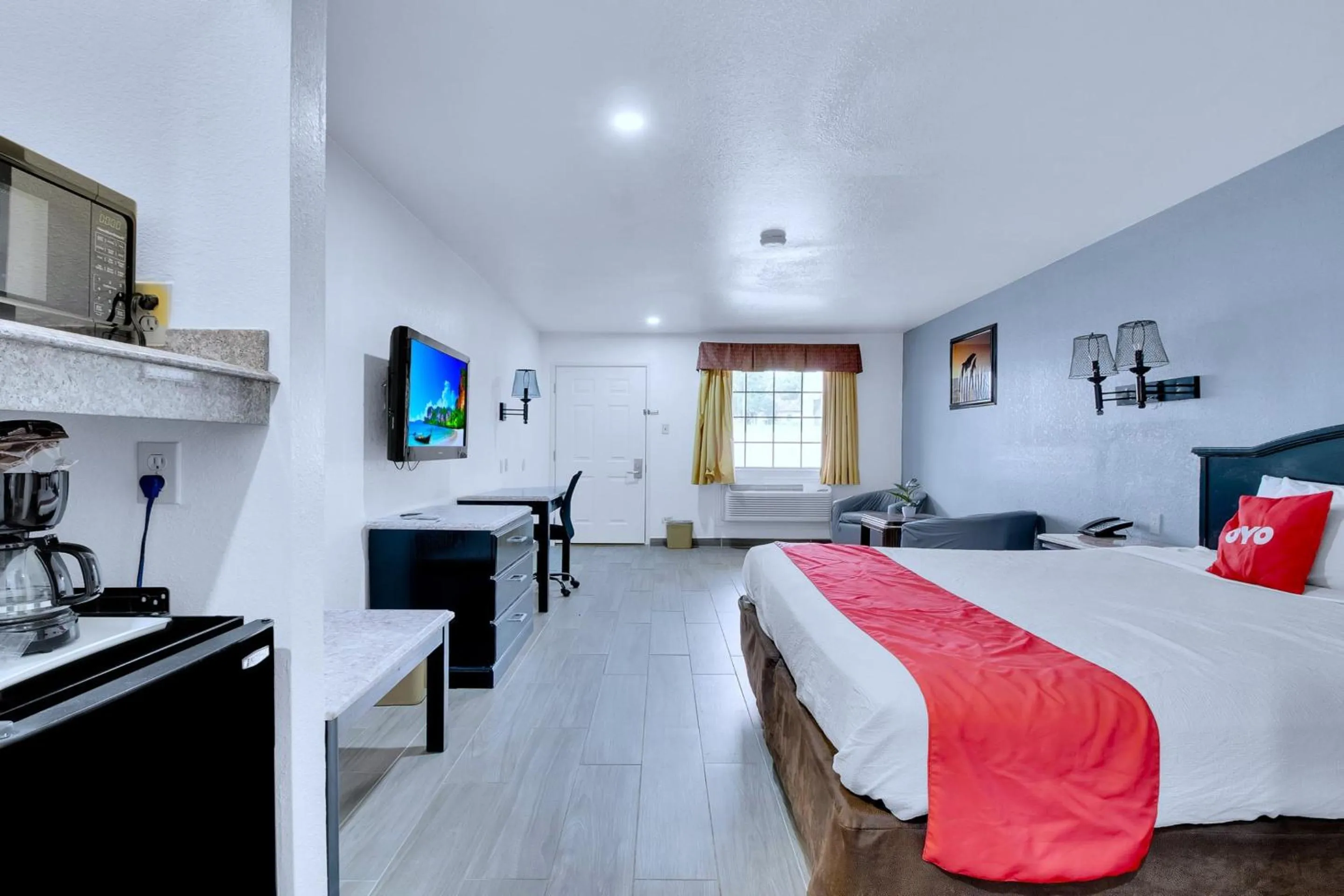 Bedroom, Bed in Three Rivers Executive Inn & Suites By OYO