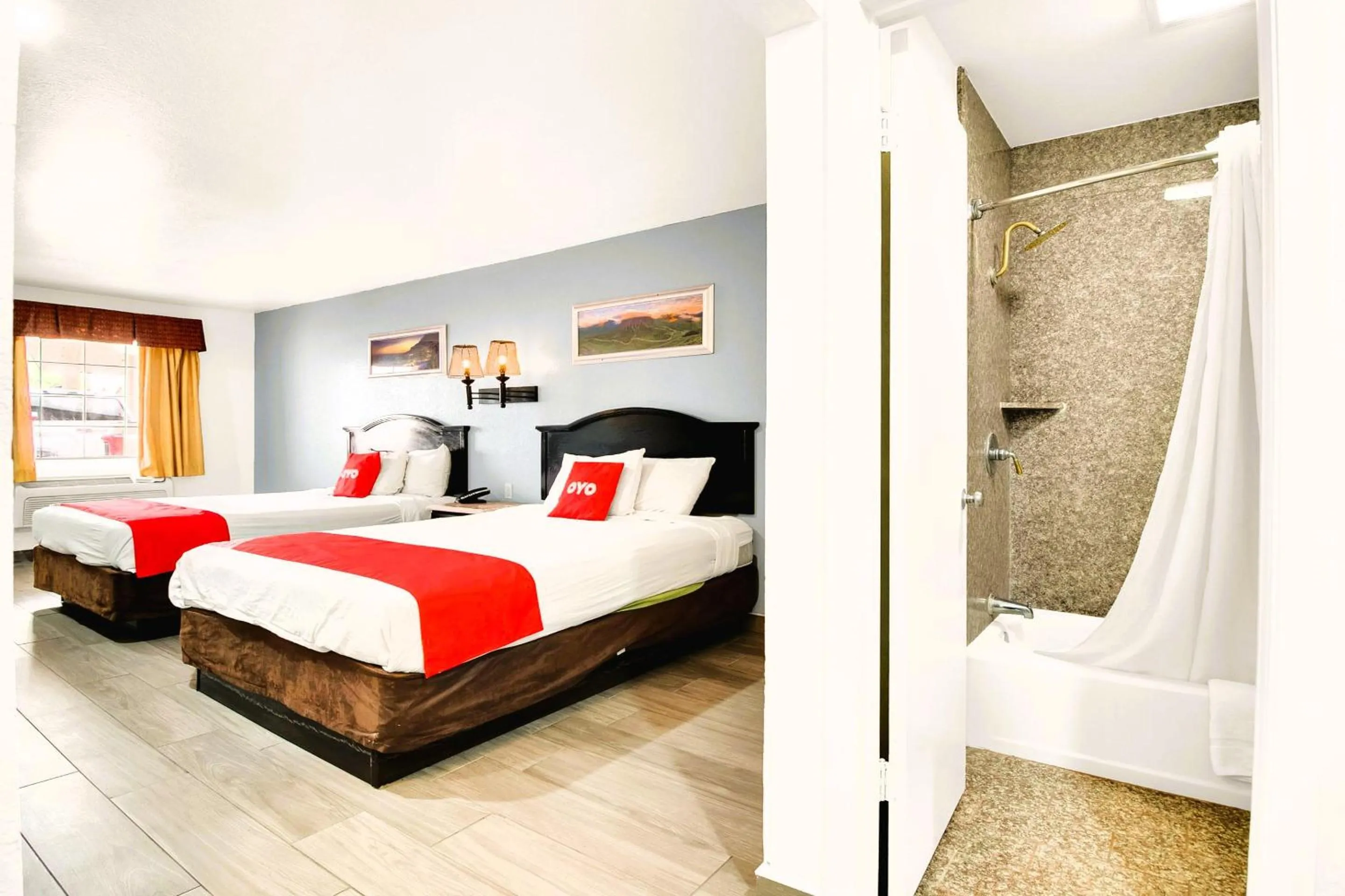 Bedroom, Bed in Three Rivers Executive Inn & Suites By OYO