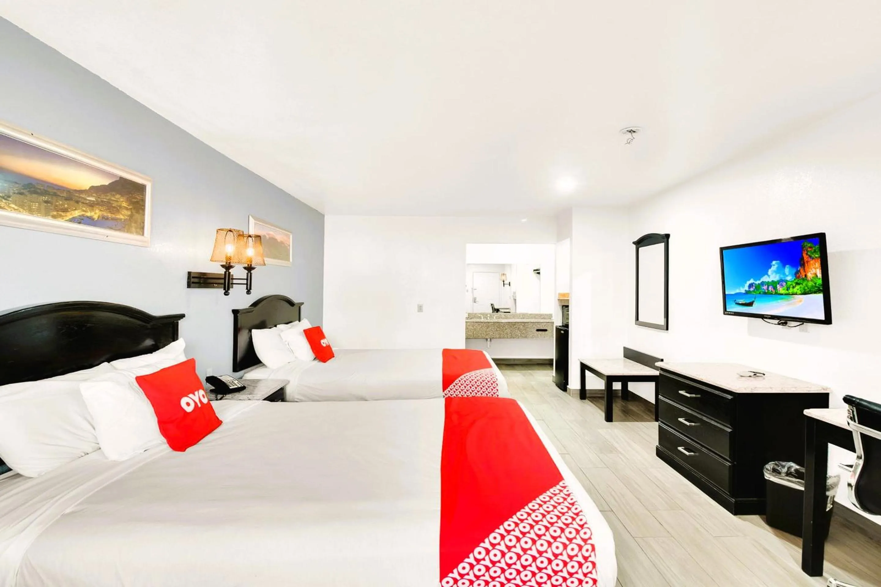 Bedroom, Bed in Three Rivers Executive Inn & Suites By OYO