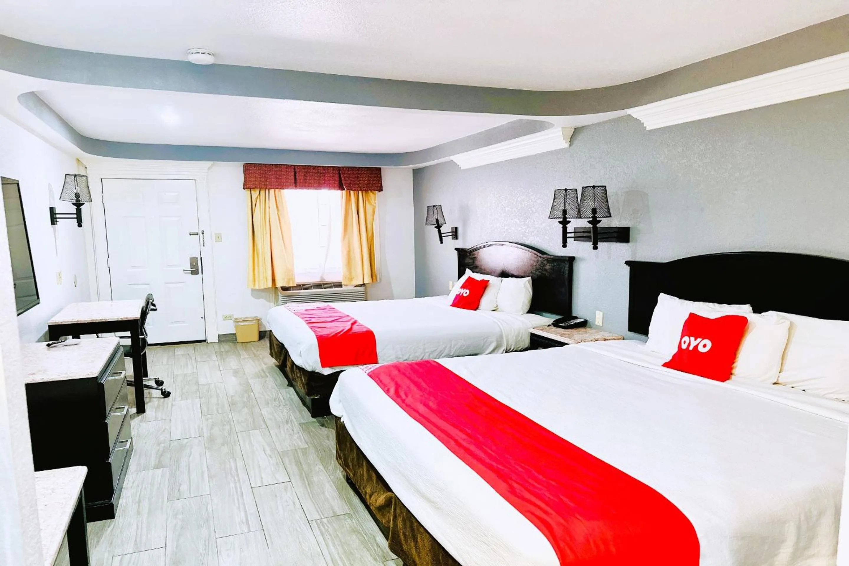 Bedroom, Bed in Three Rivers Executive Inn & Suites By OYO