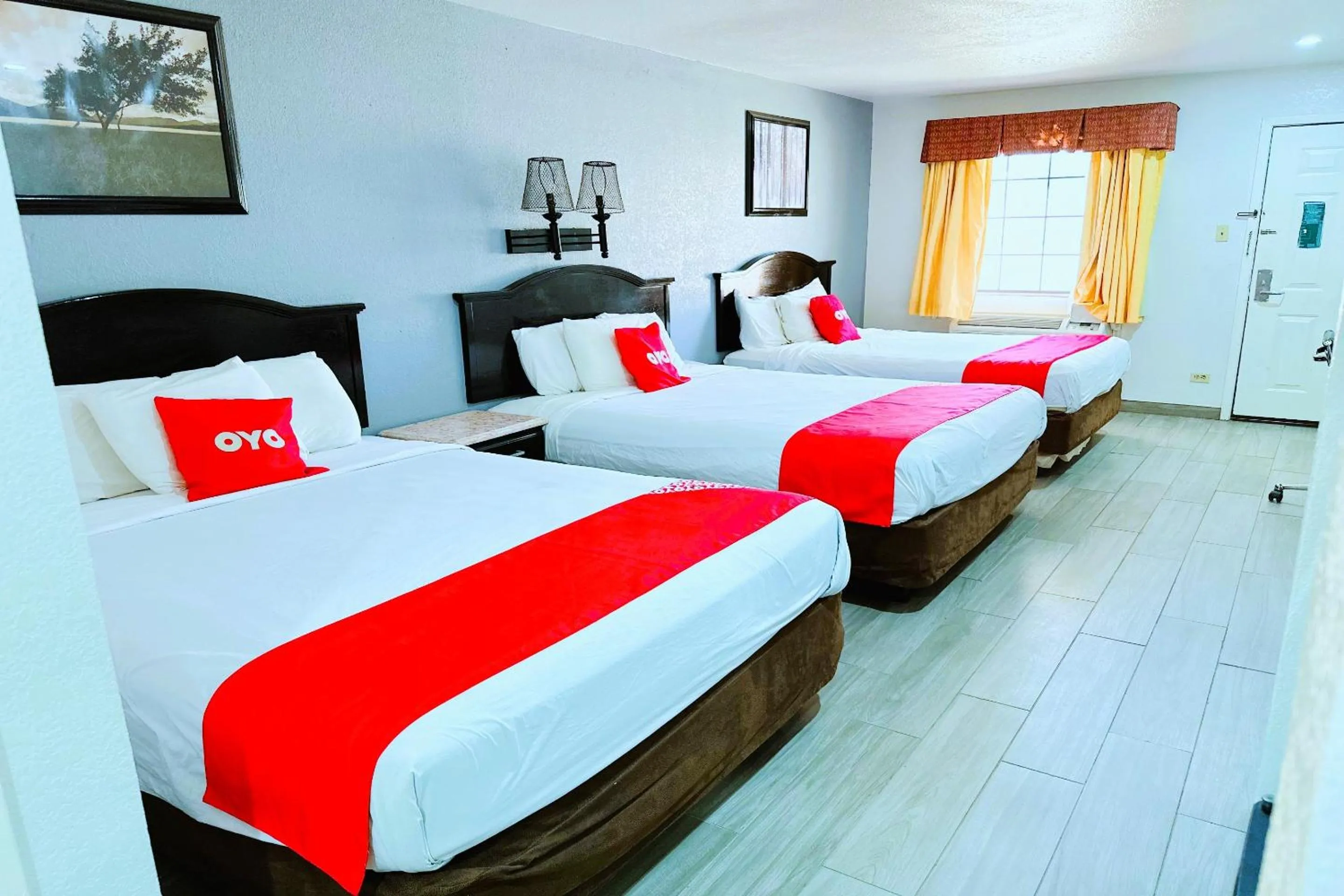 Bedroom, Bed in Three Rivers Executive Inn & Suites By OYO