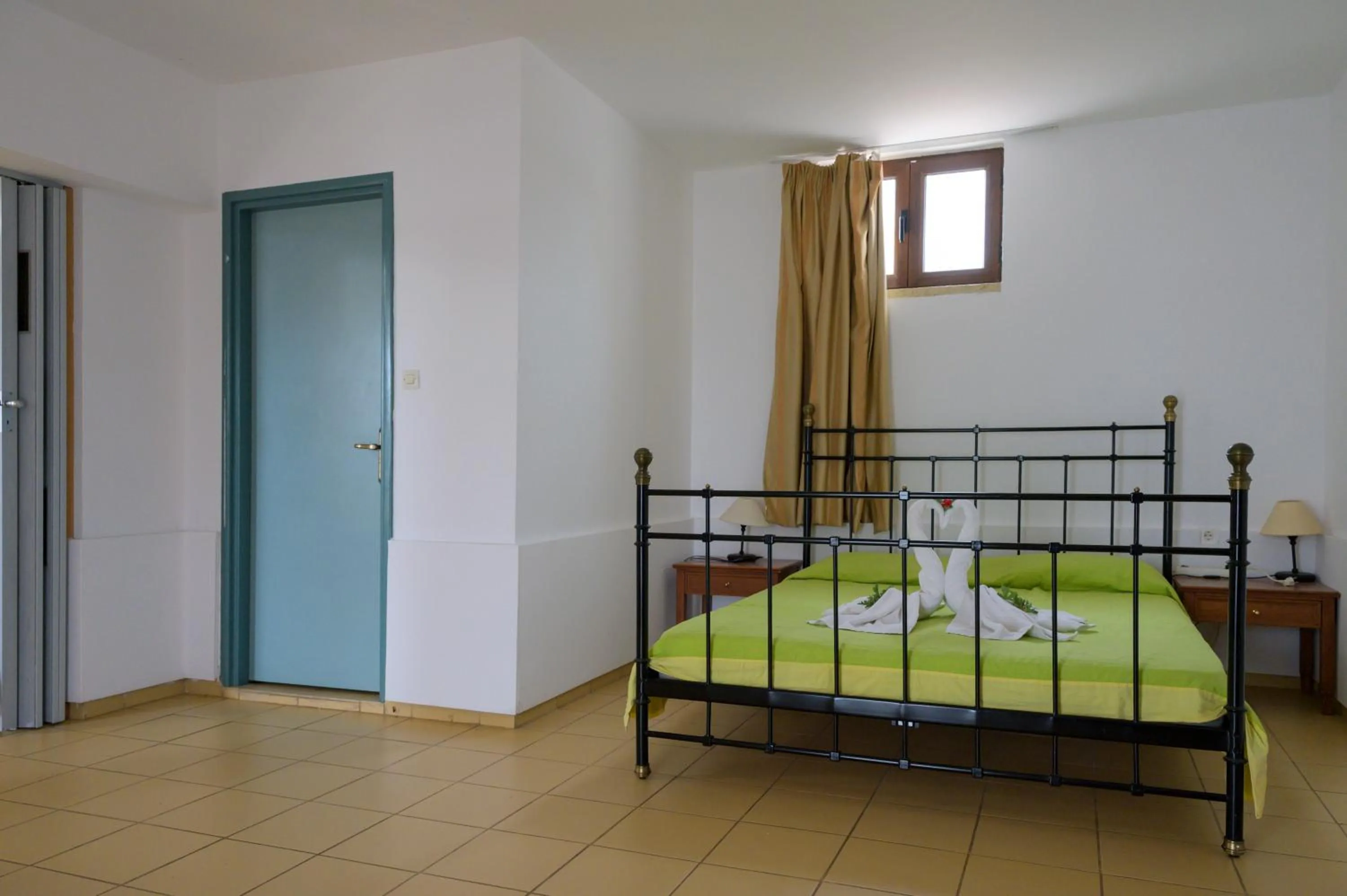 Bed in Areti Aparthotel