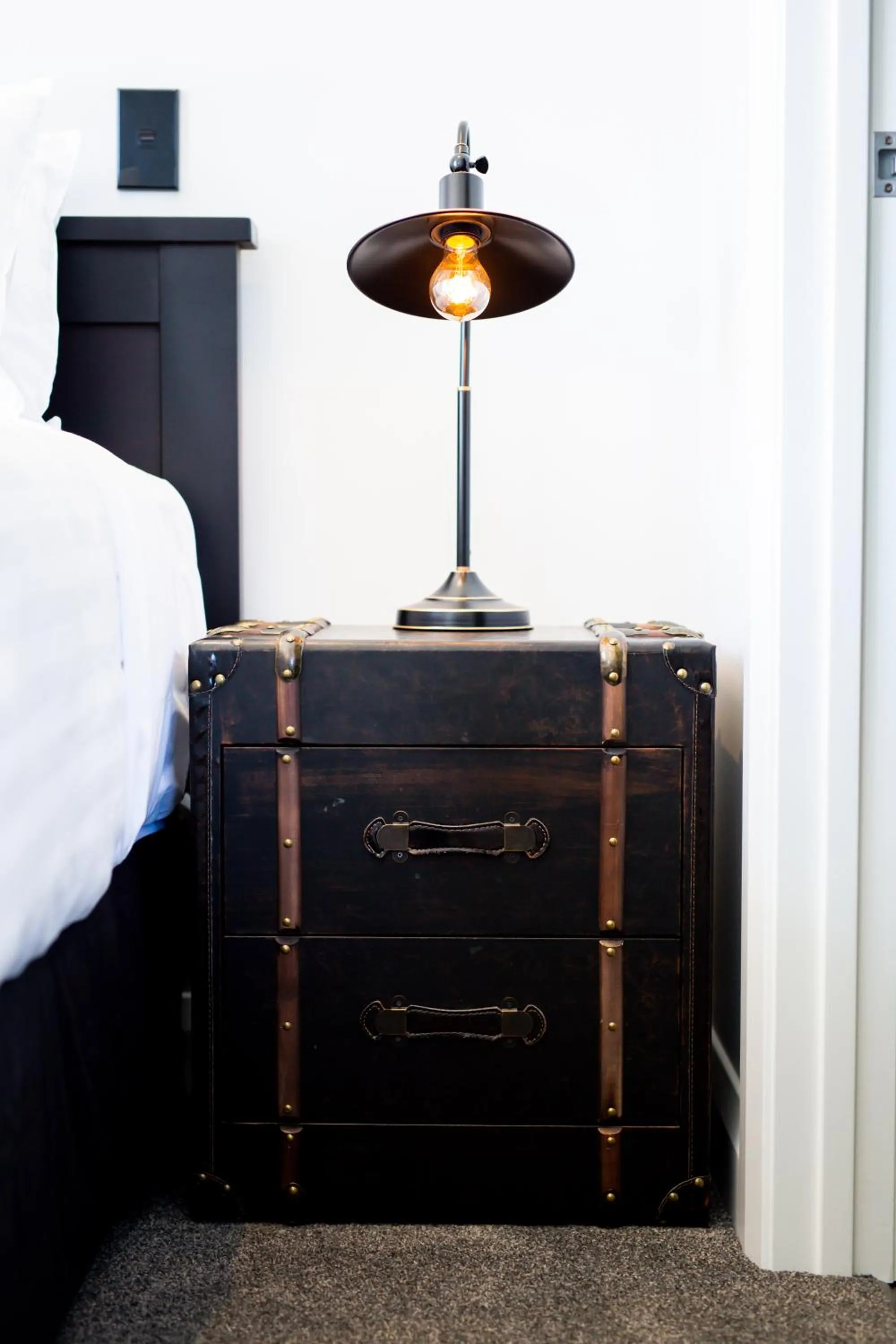Decorative detail, Bed in Hokitika Fire Station Boutique Accommodation