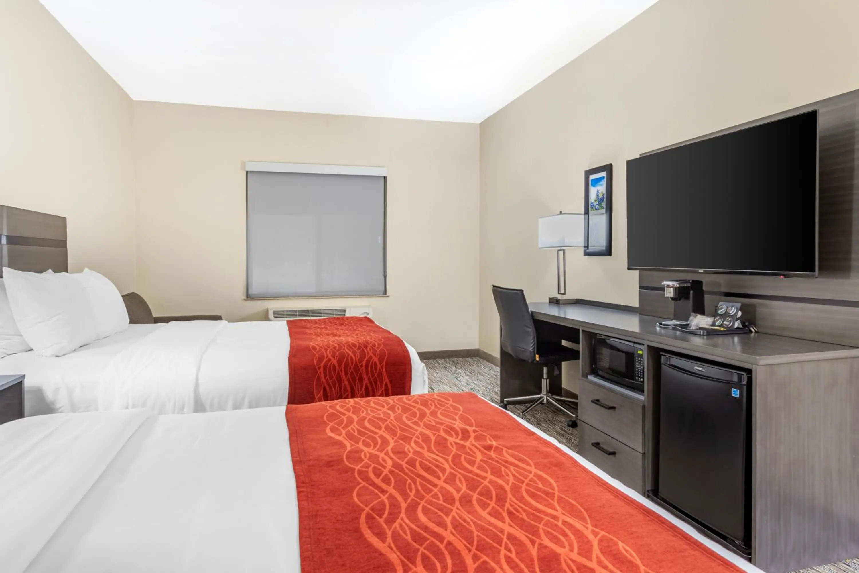 Bed in Comfort Inn by Choice Hotels Orange, TX