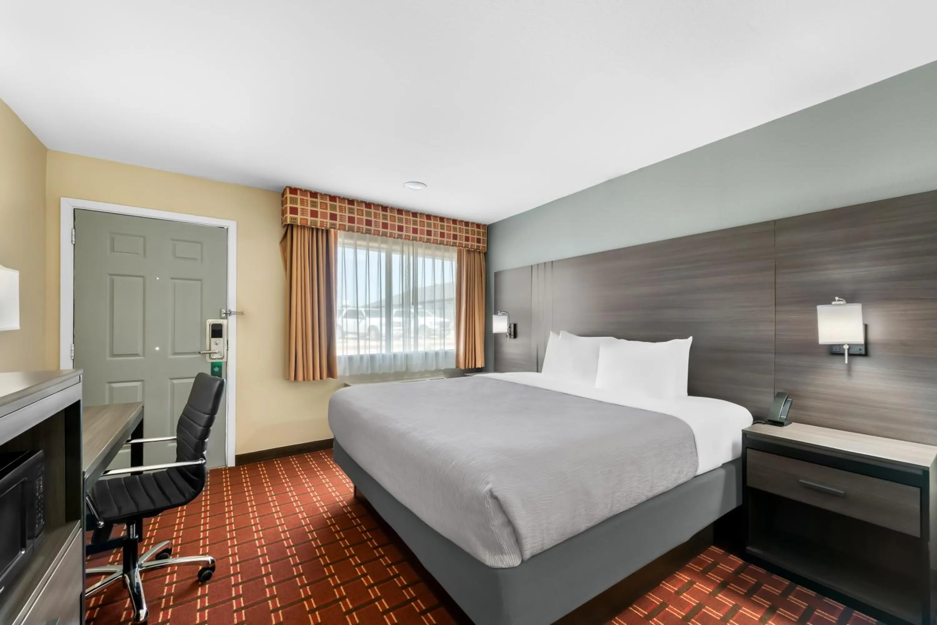 Bed in Quality Inn Marshall