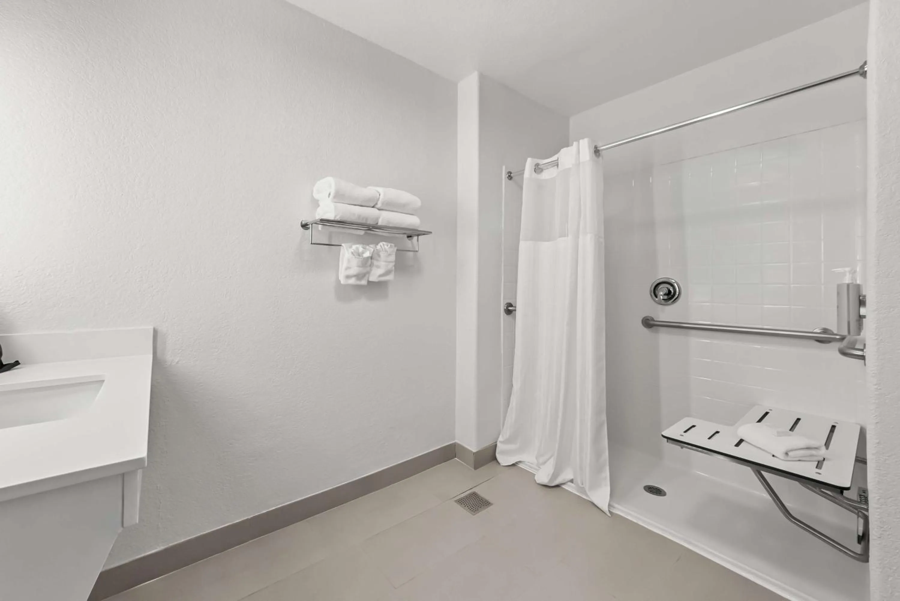 Bathroom in Spark by Hilton Selma