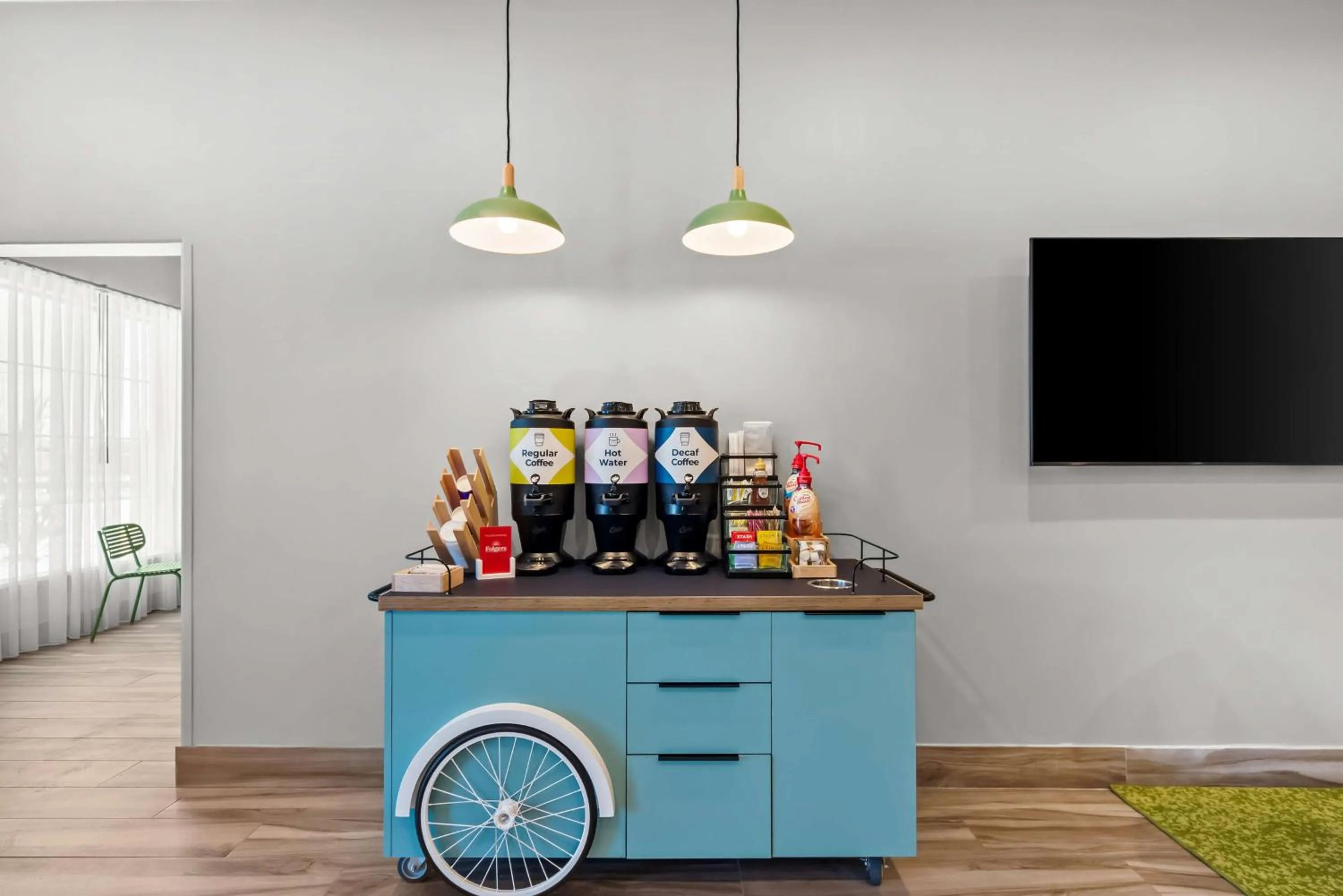 Dining area in Spark by Hilton Selma