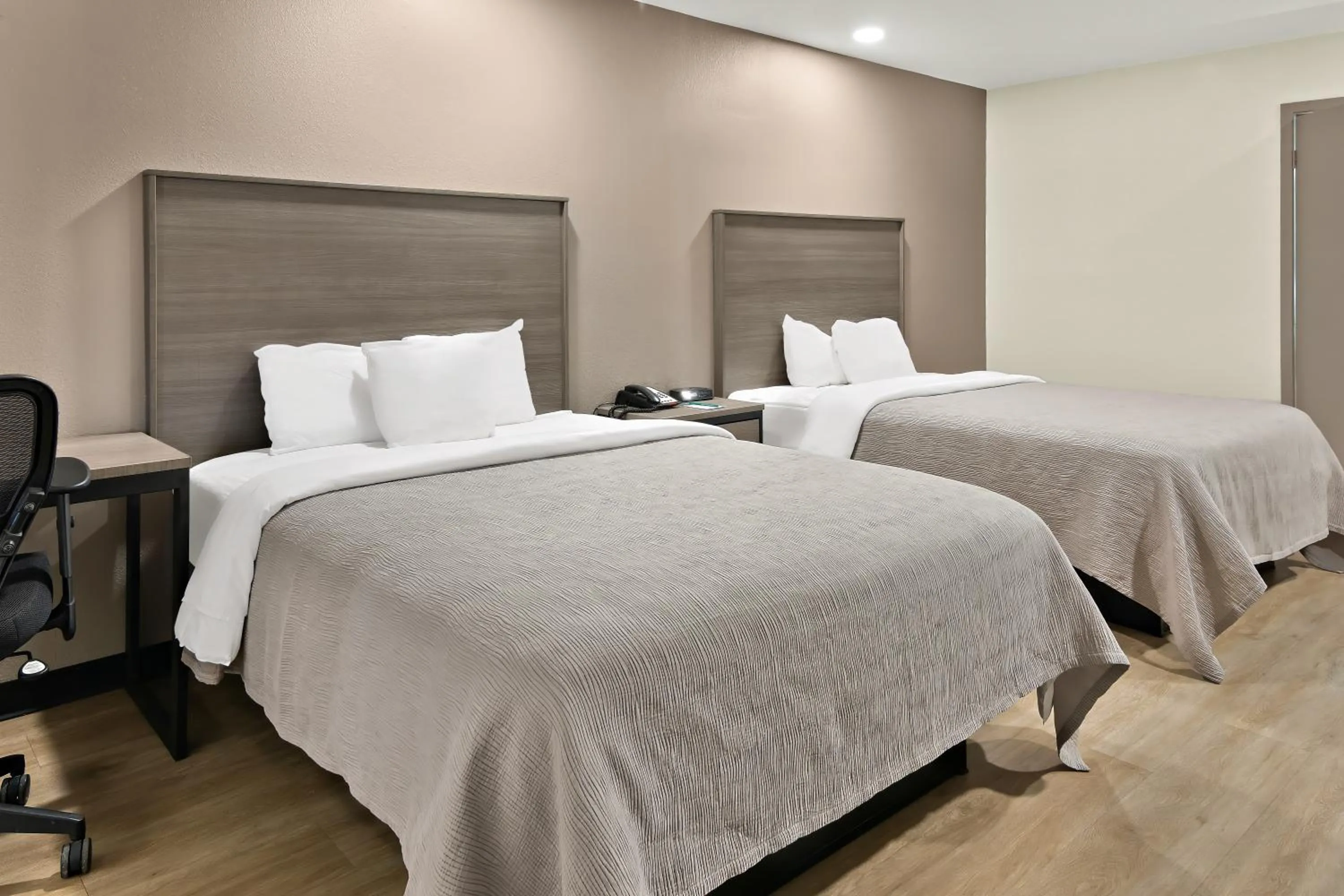 Bed in Quality Inn & Suites Weatherford