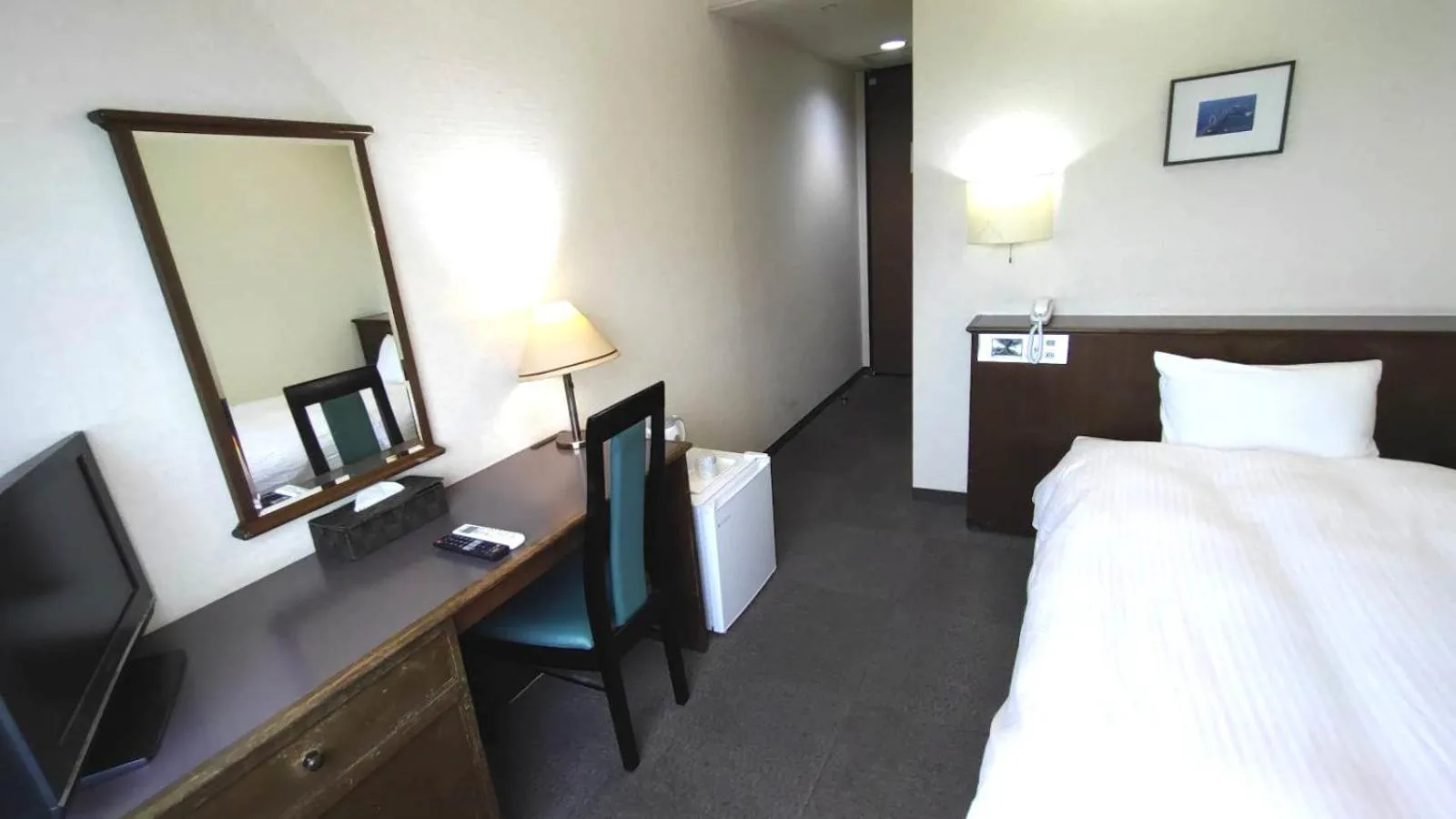 Bed in Hotel New Century Sakaide