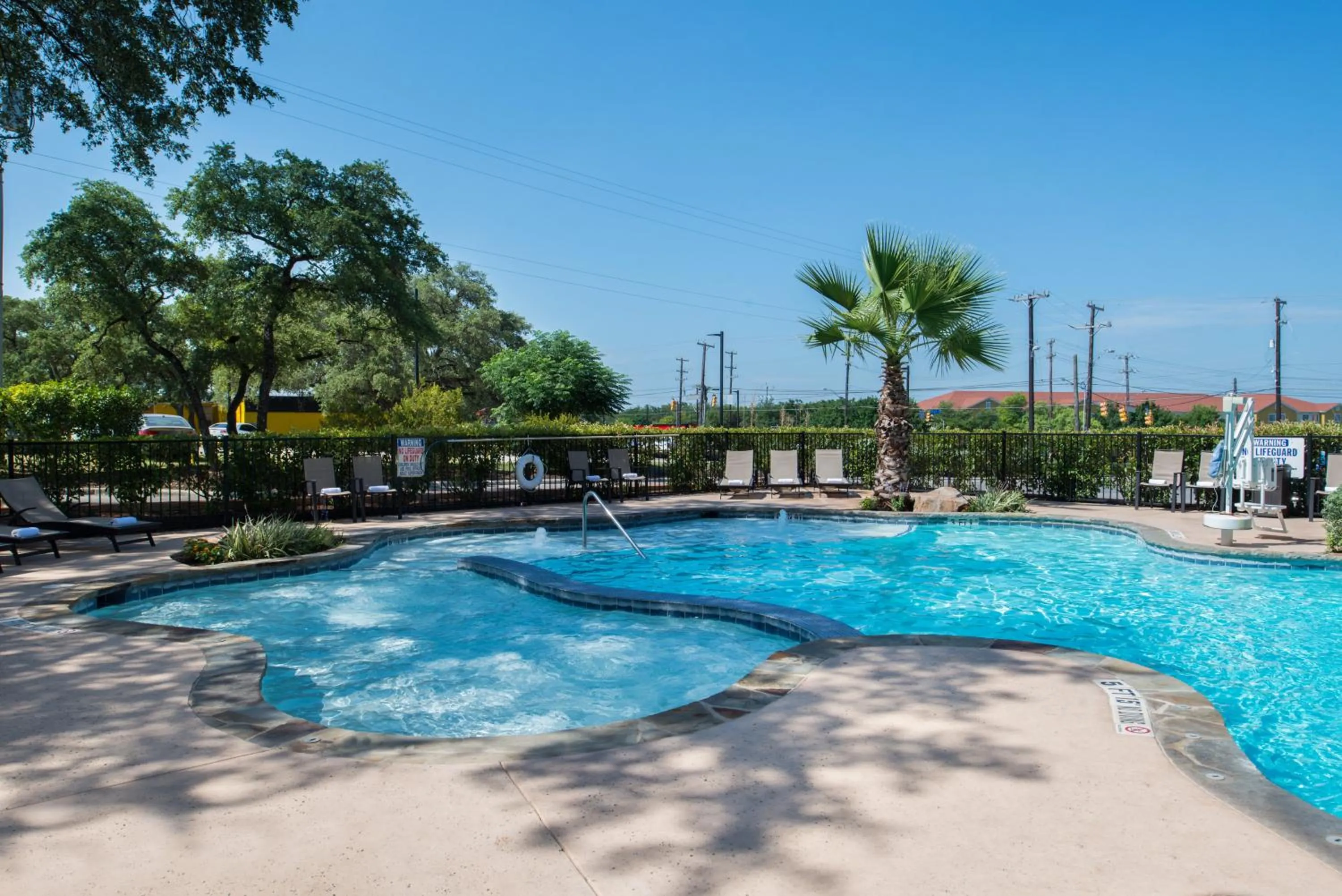 Swimming pool in Holiday Inn Express & Suites San Antonio Medical - Six Flags by IHG