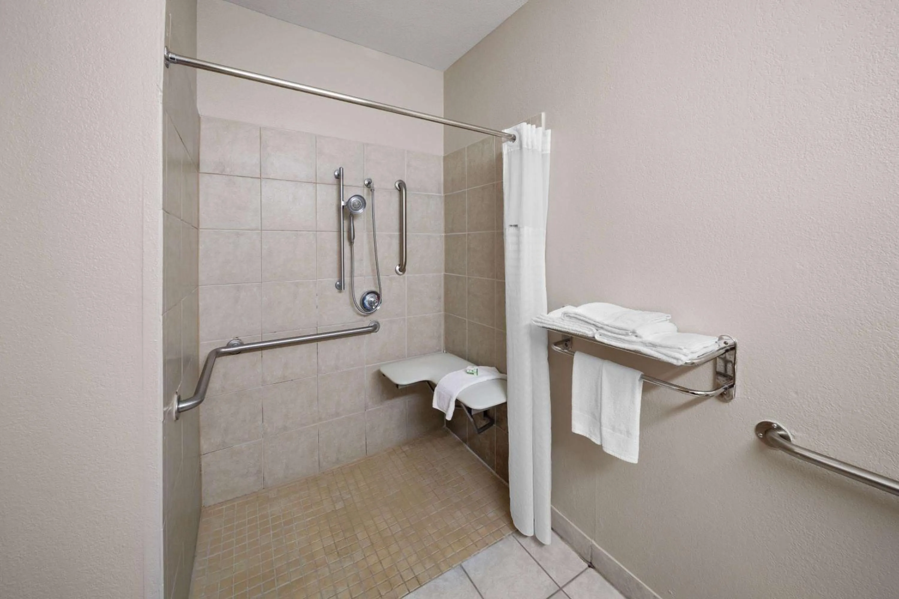 Shower in Baymont by Wyndham Houston Brookhollow