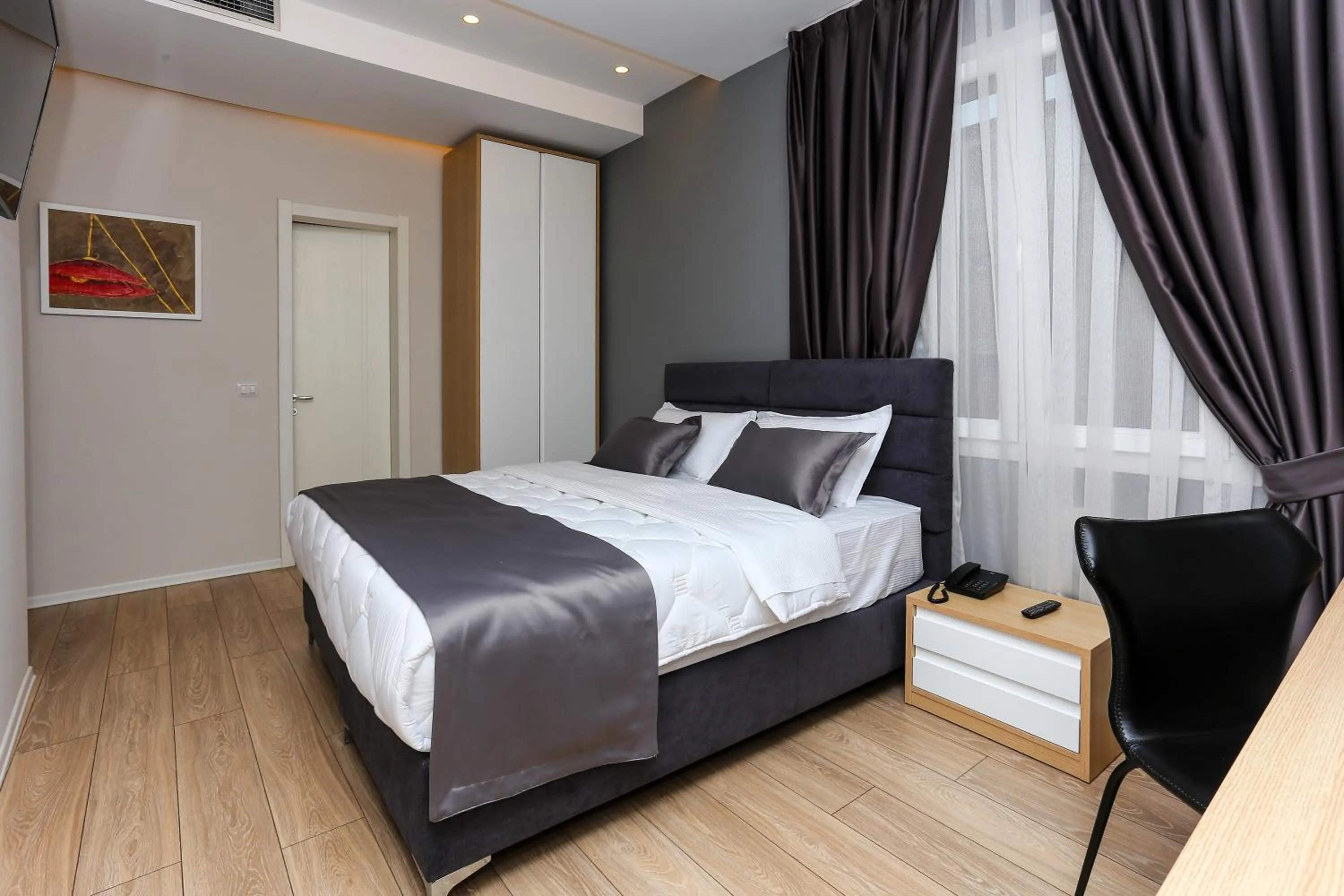 Bed in Emerald Boutique Hotel