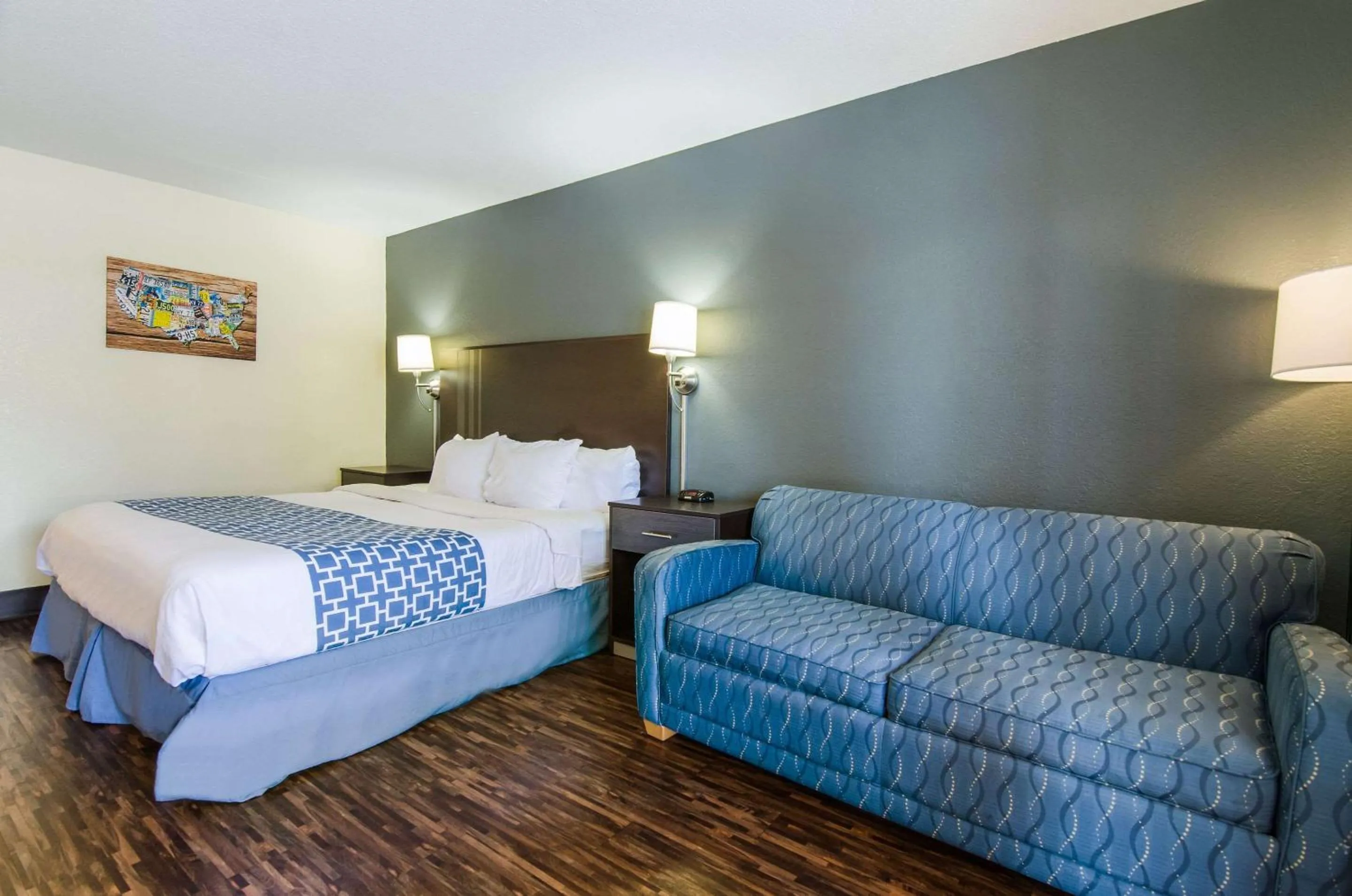 Photo of the whole room, Bed in Econo Lodge Near Motor Speedway