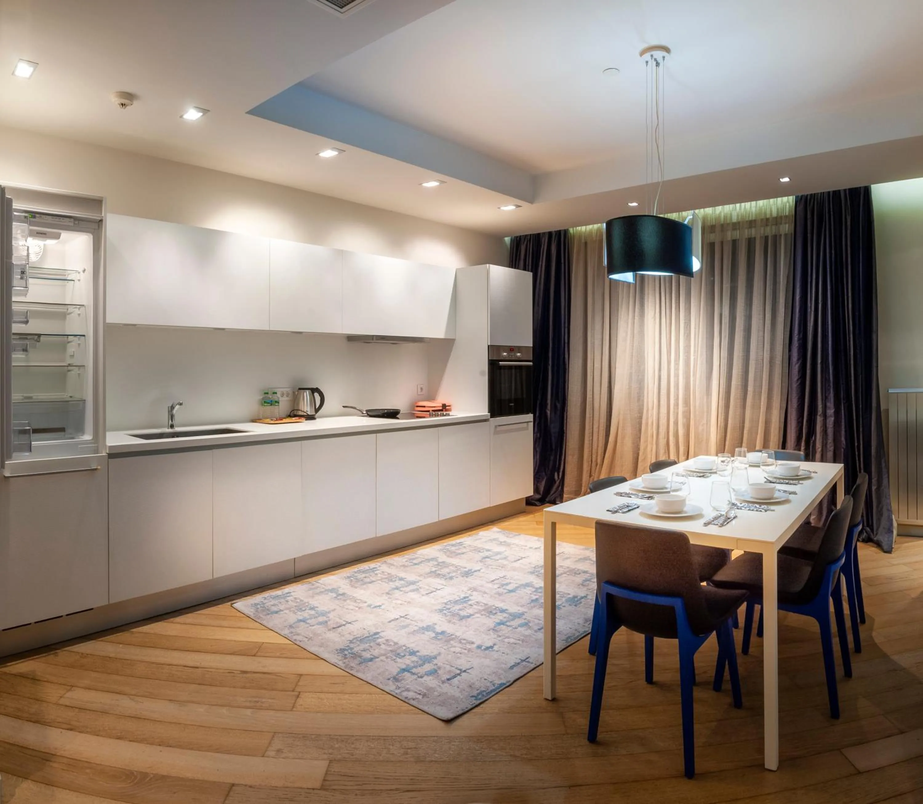 Kitchen or kitchenette in Armoni Residence & Hotel