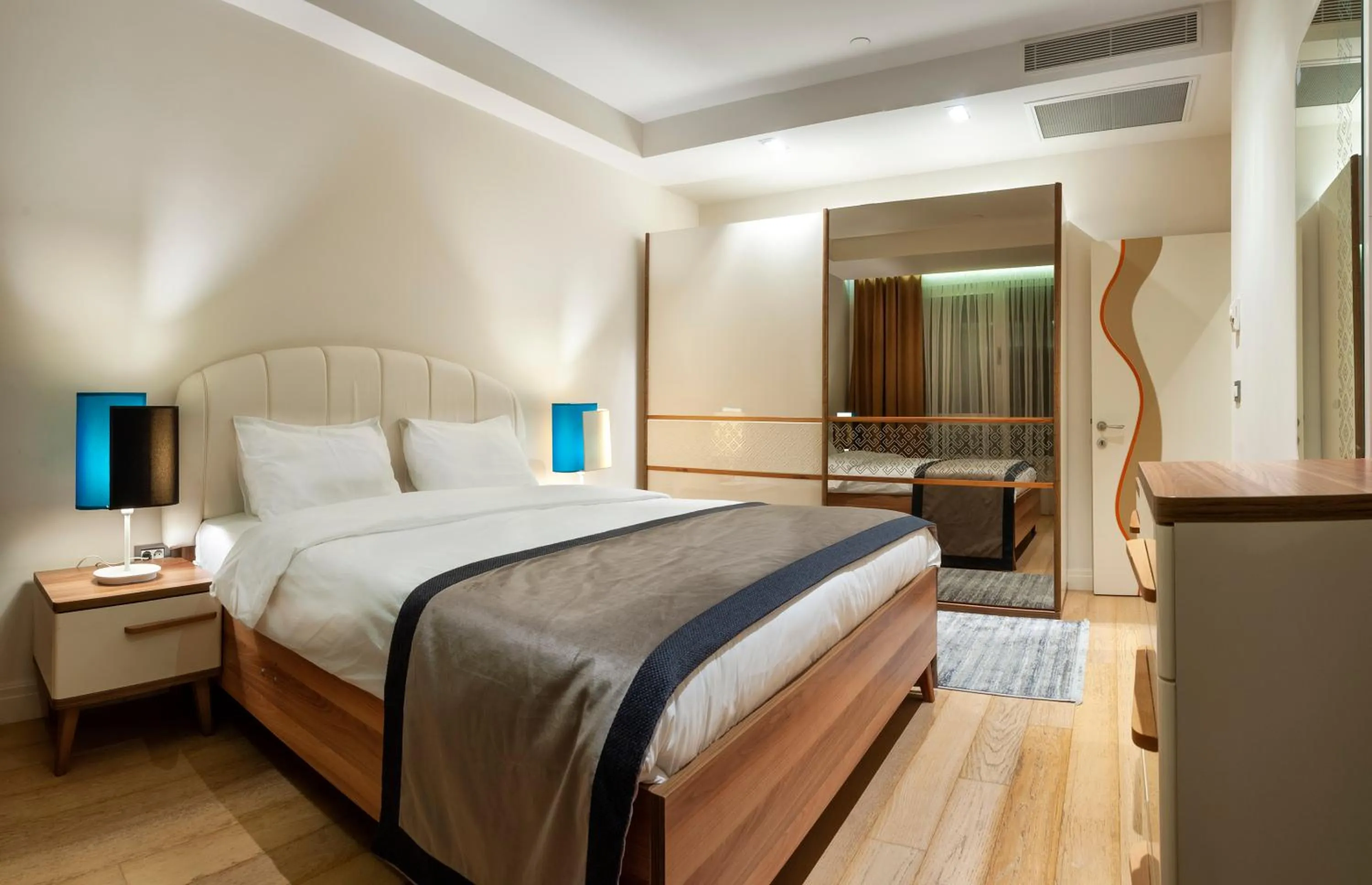 Bed in Armoni Residence & Hotel