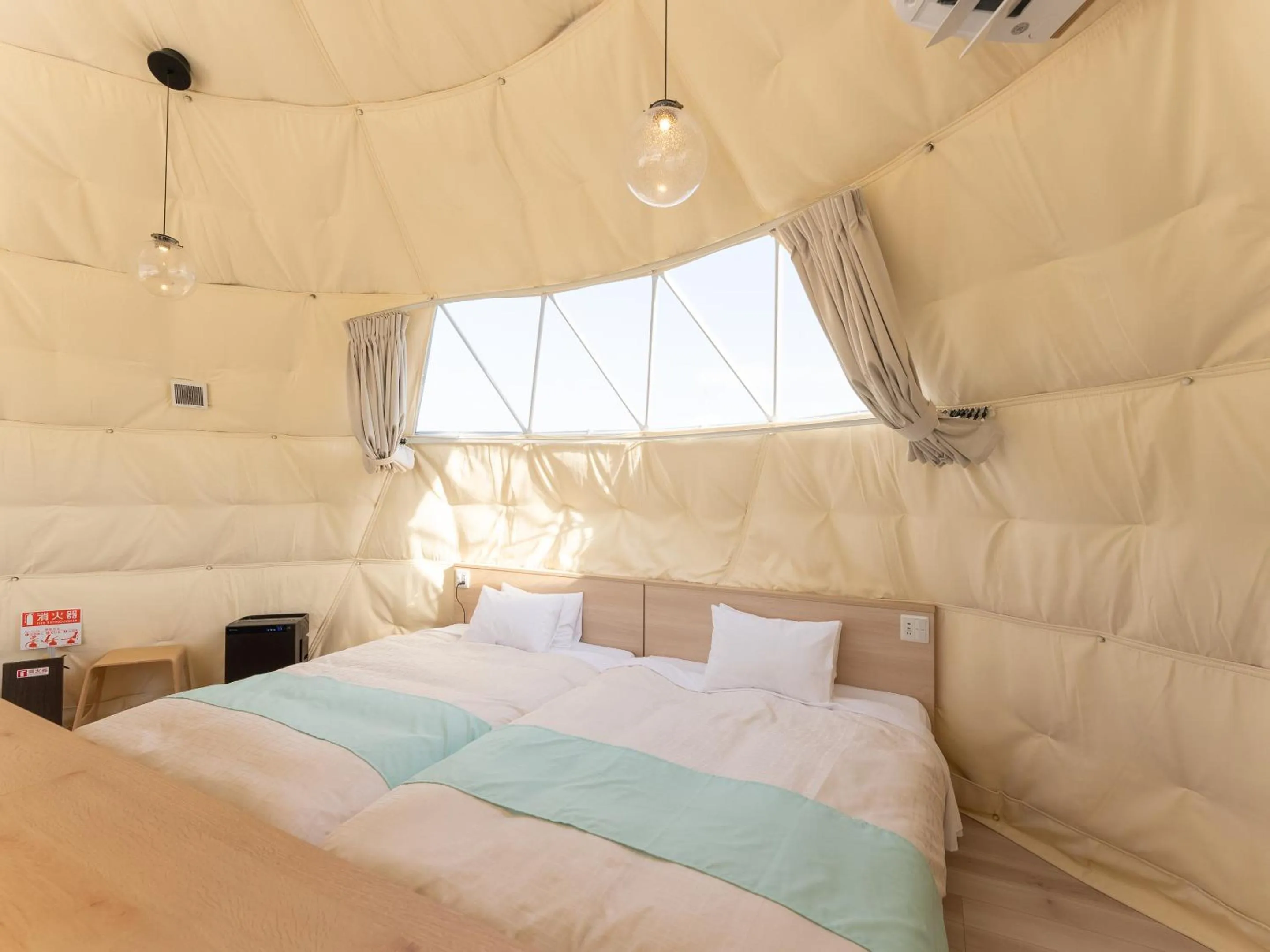 Bed in LiVEMAX RESORT Sakurajima Sea Front