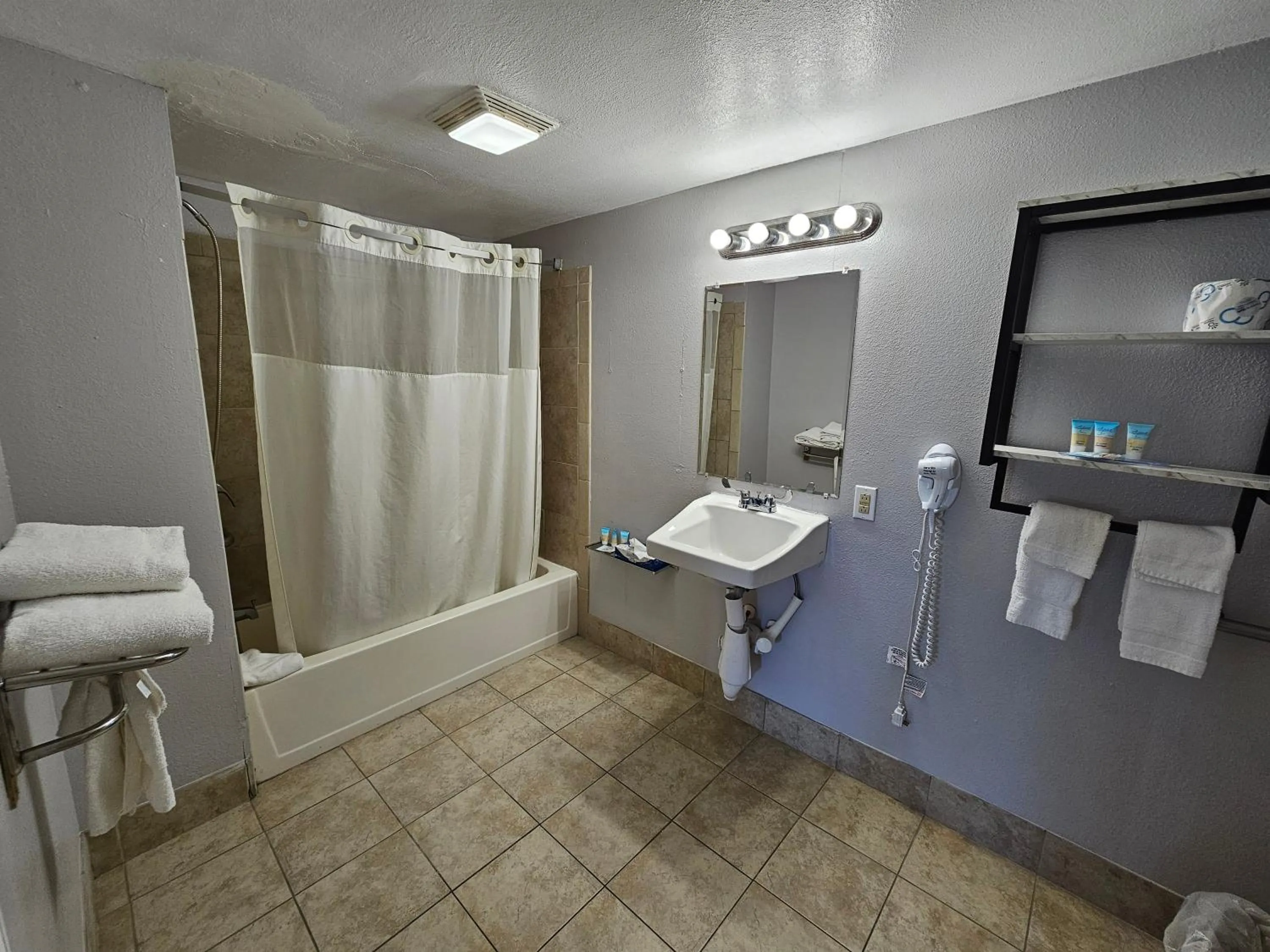 Bathroom in Atlantic Shores Inn and Suites