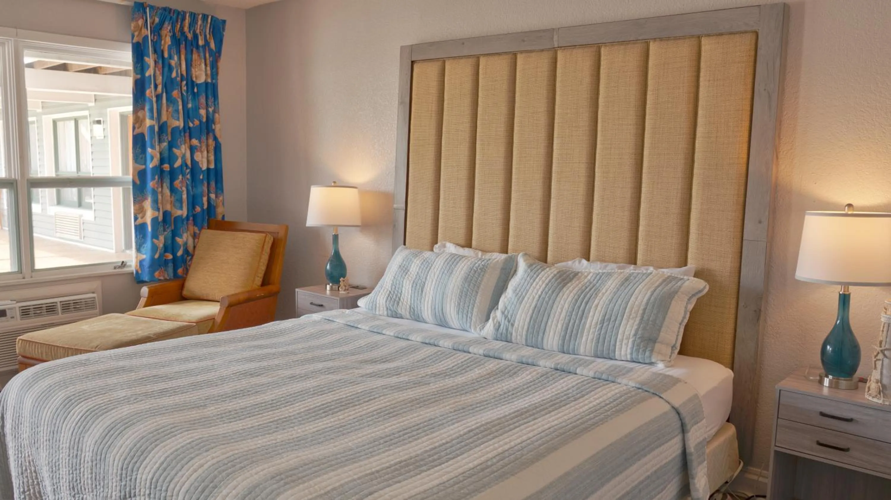 Bed in Atlantic Shores Inn and Suites