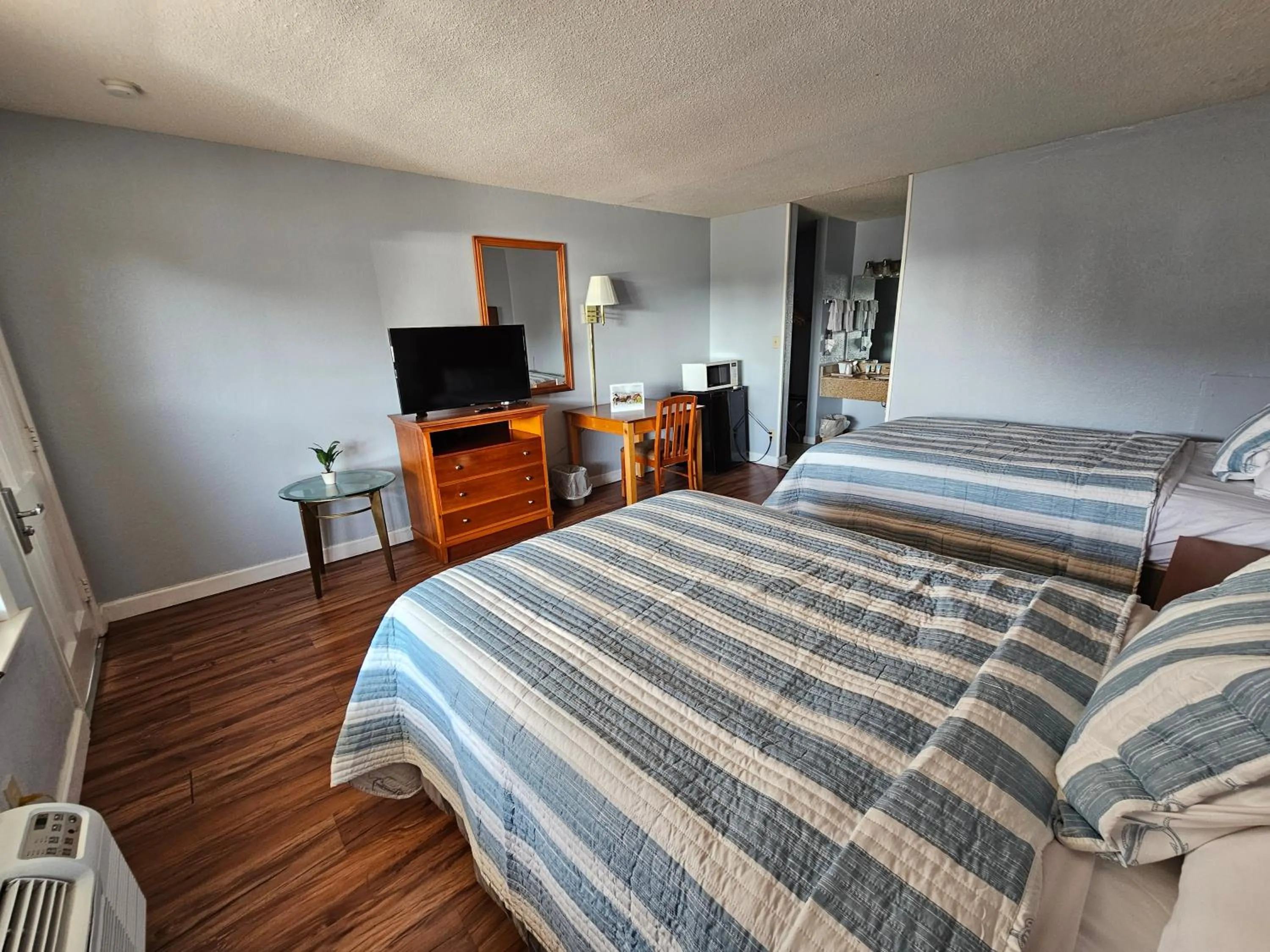 Bedroom, Bed in Atlantic Shores Inn and Suites