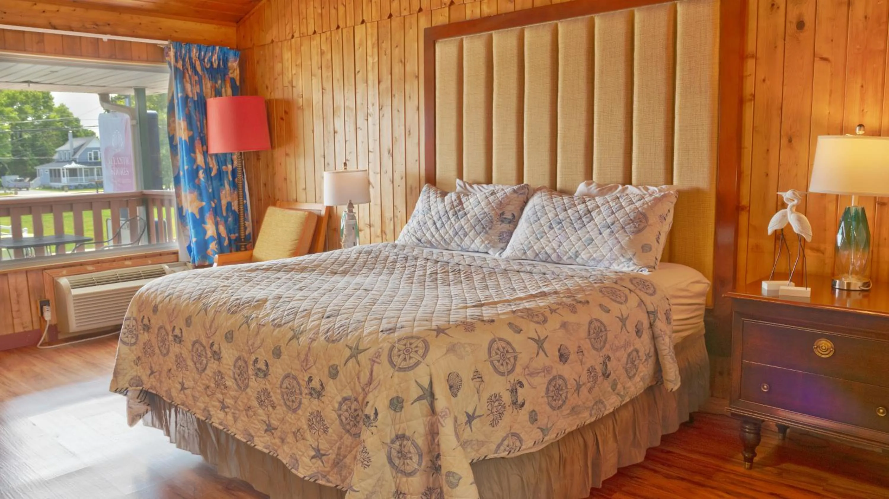 Bed in Atlantic Shores Inn and Suites