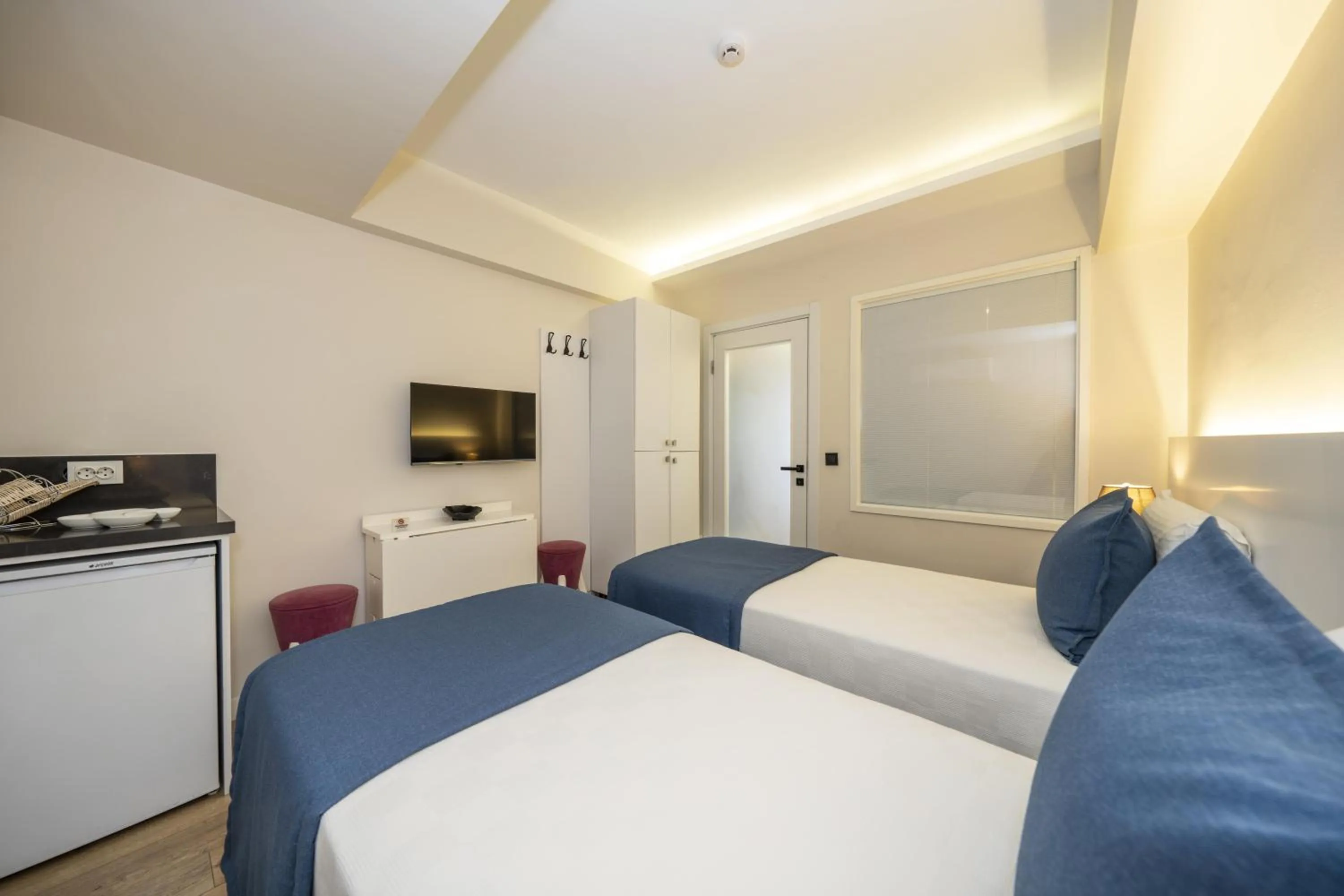 Bed in Ece Marina Suites