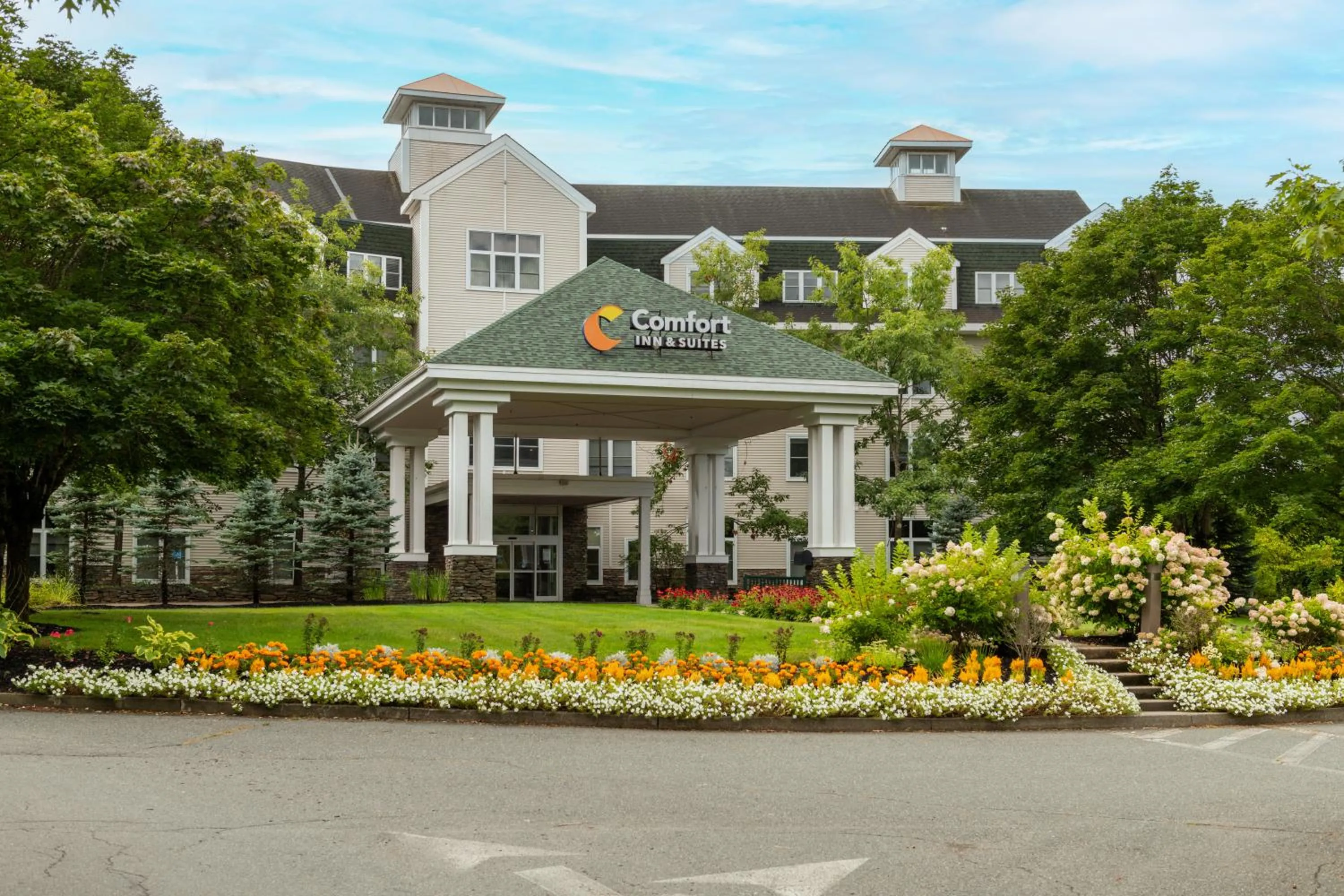 Property logo or sign in Comfort Inn & Suites Near Burke Mountain