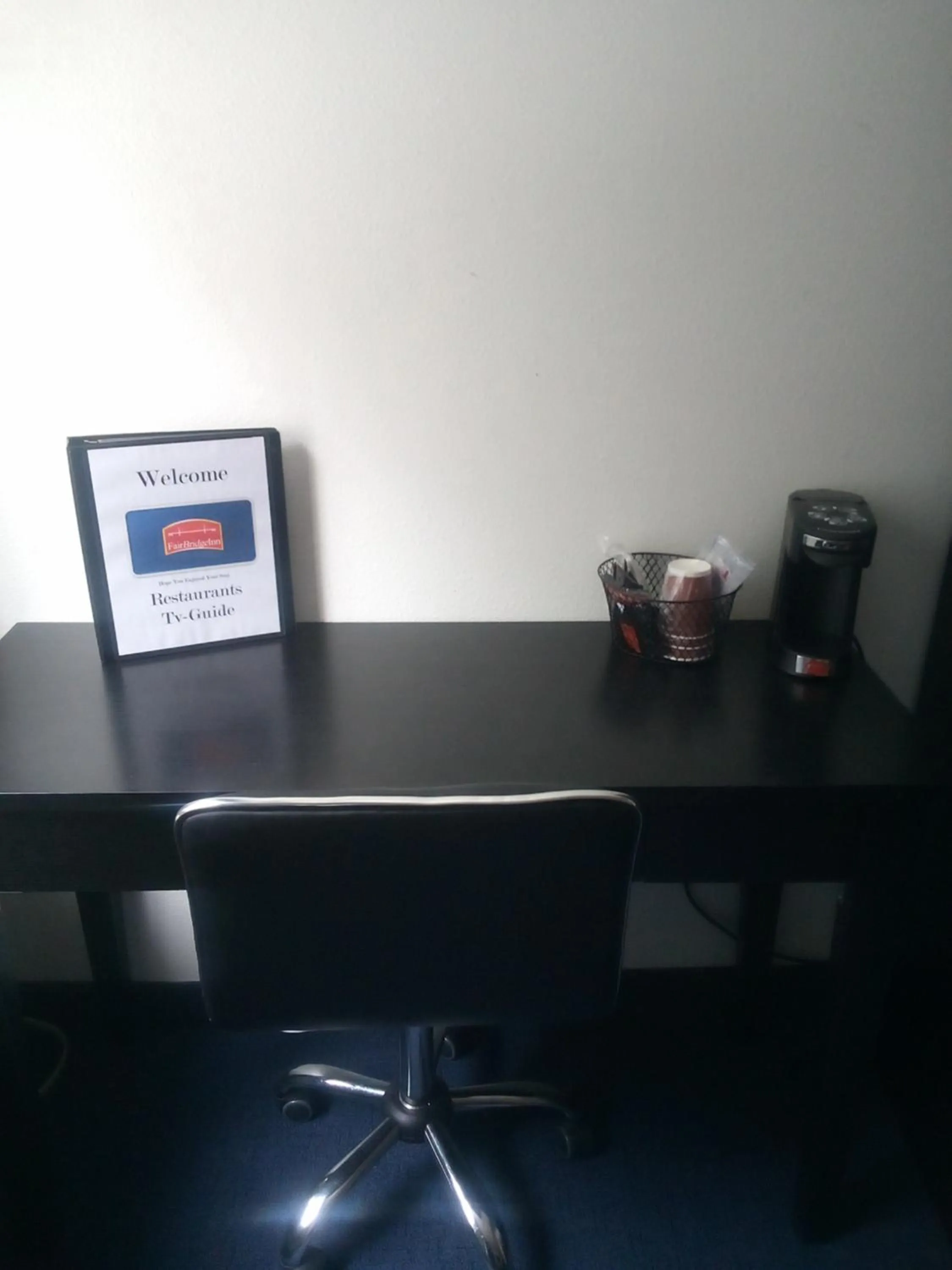 Property logo or sign in FairBridge Inn & Suites Sunnyside