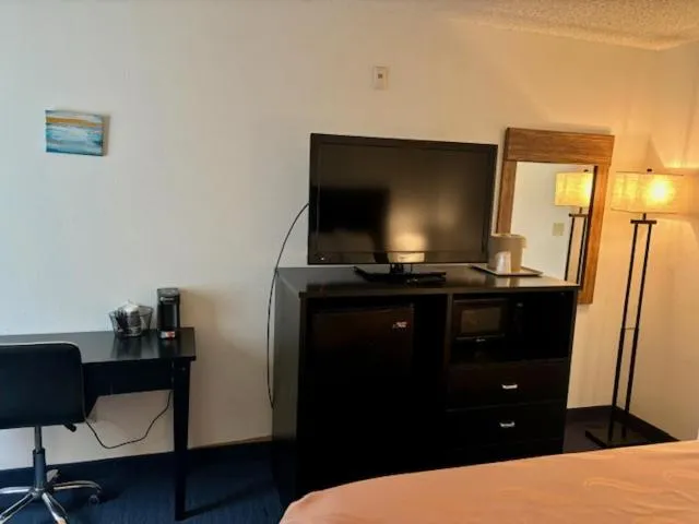 Bed in FairBridge Inn & Suites Sunnyside