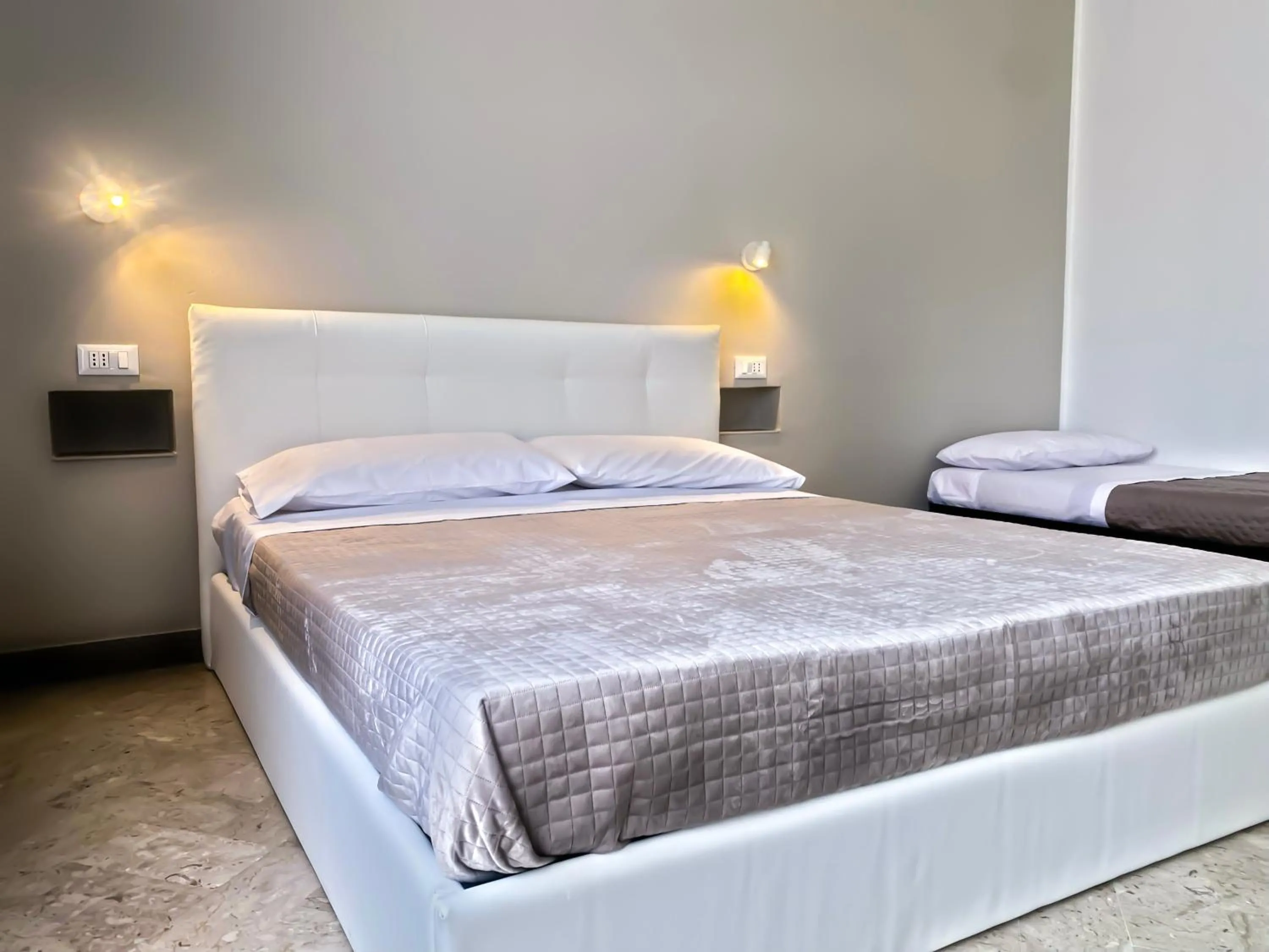 Bed in Leone Suite B&B & Restaurant AIC